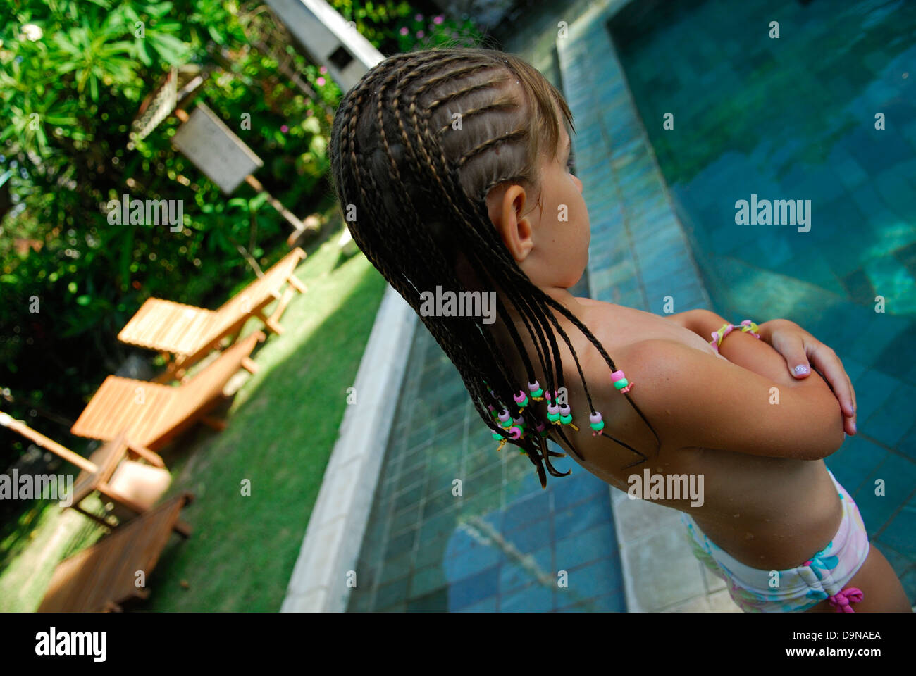 Australian Child 6 Years Old Standing Near Swimming Pool With