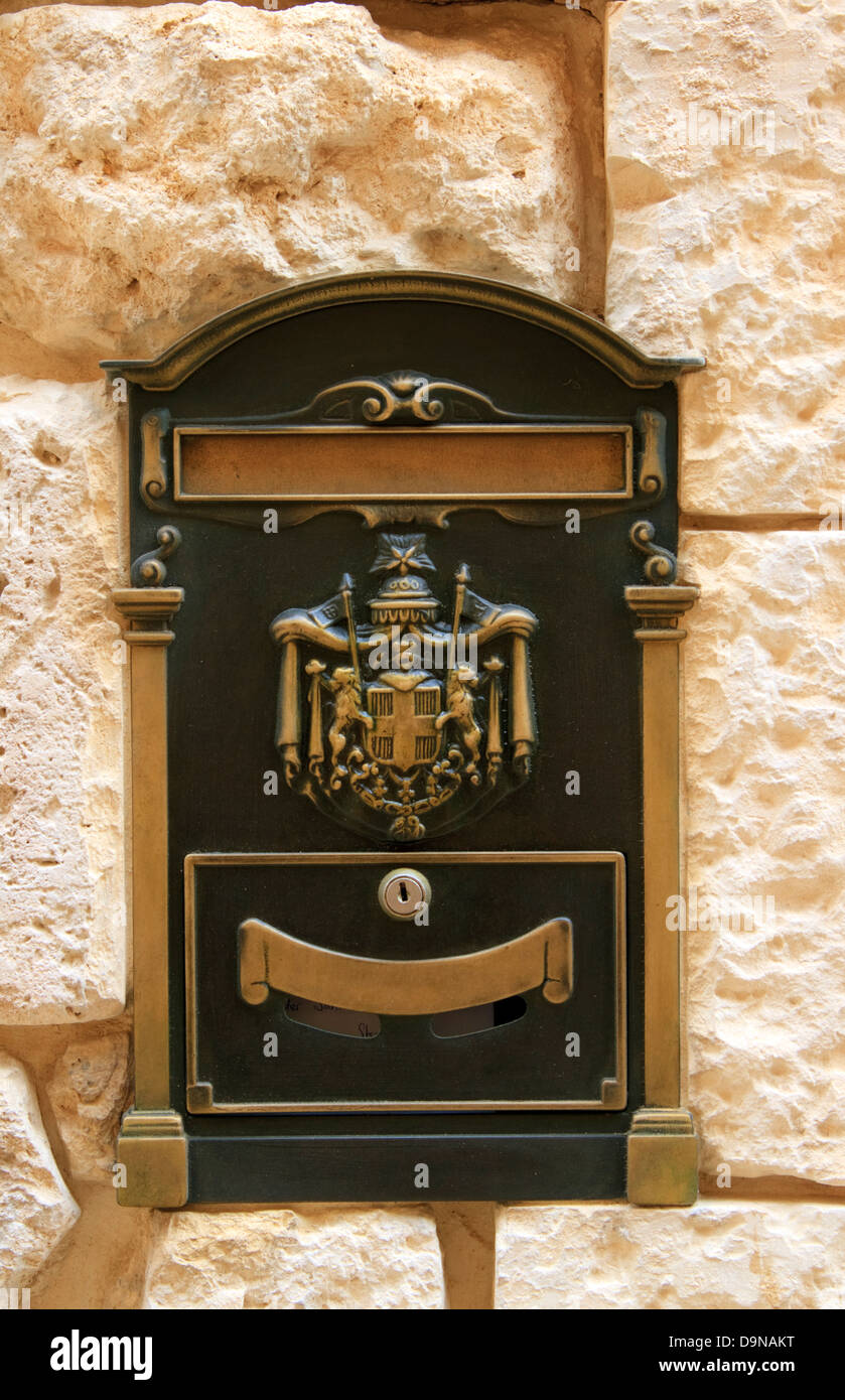 Letter box built into a wall in Valletta Malta Stock Photo