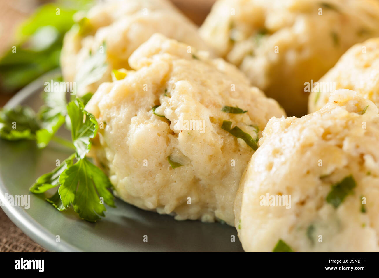 Homemade Matzo Ball Dumplings with Parsley for passover Stock Photo