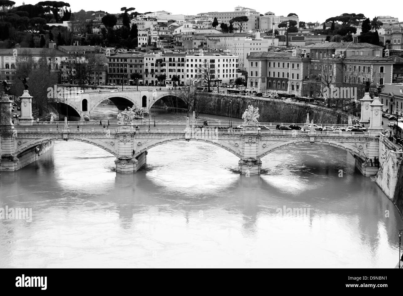 Tiber river. Vittorio Emanuele bridge. Monochrome photography. Stock Photo