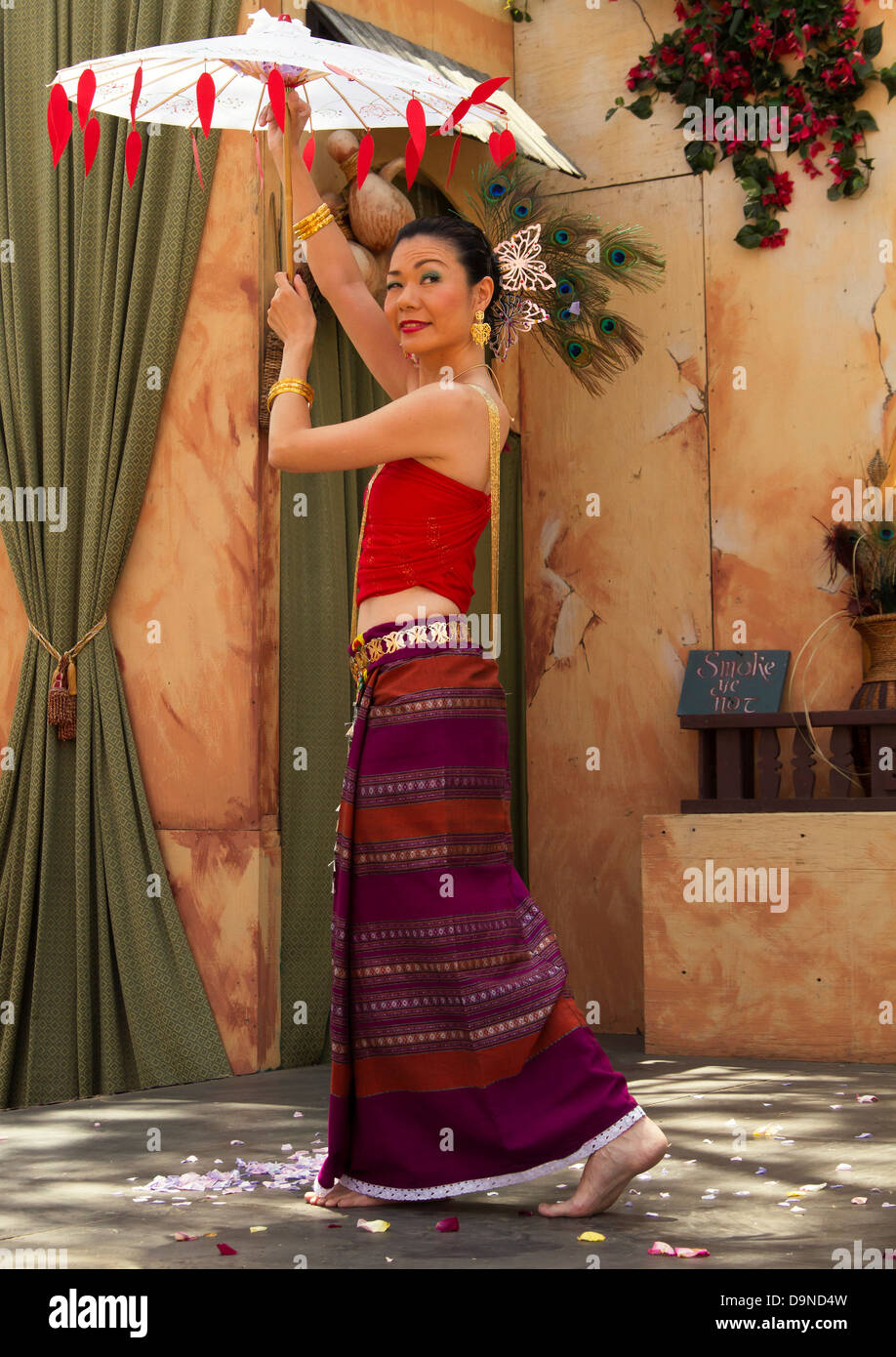Young lady performing a traditional Thai dance Stock Photo