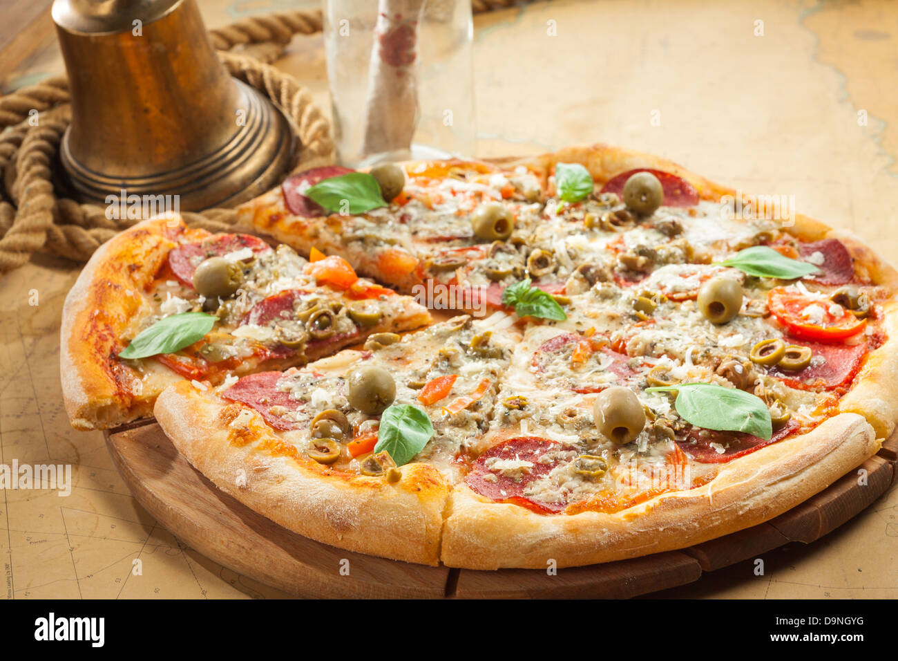 Sailor's pizza with fresh basil Stock Photo Alamy