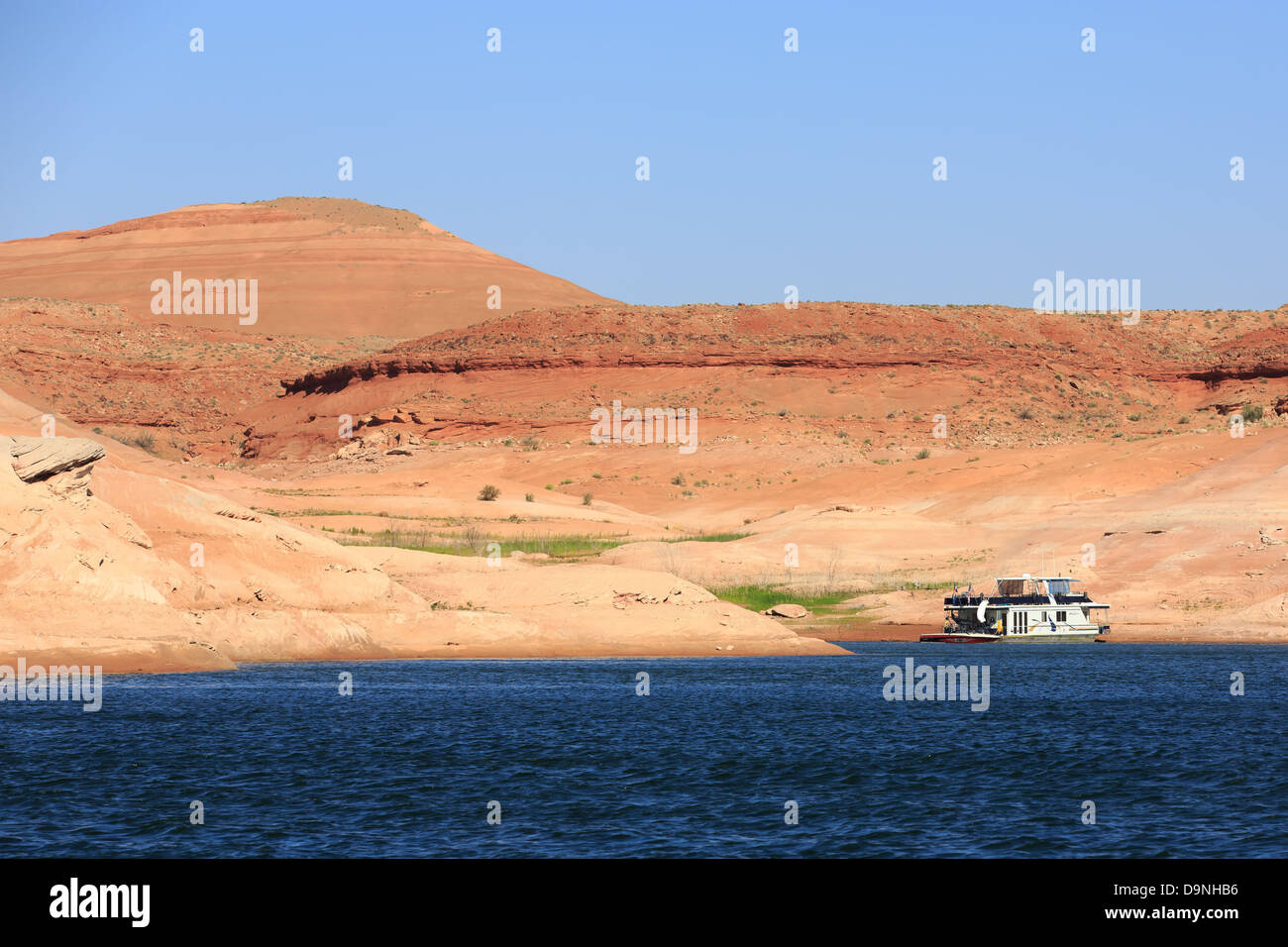 A beached houseboat in Bullfrog Bay at Lake Powell in Utah Stock Photo