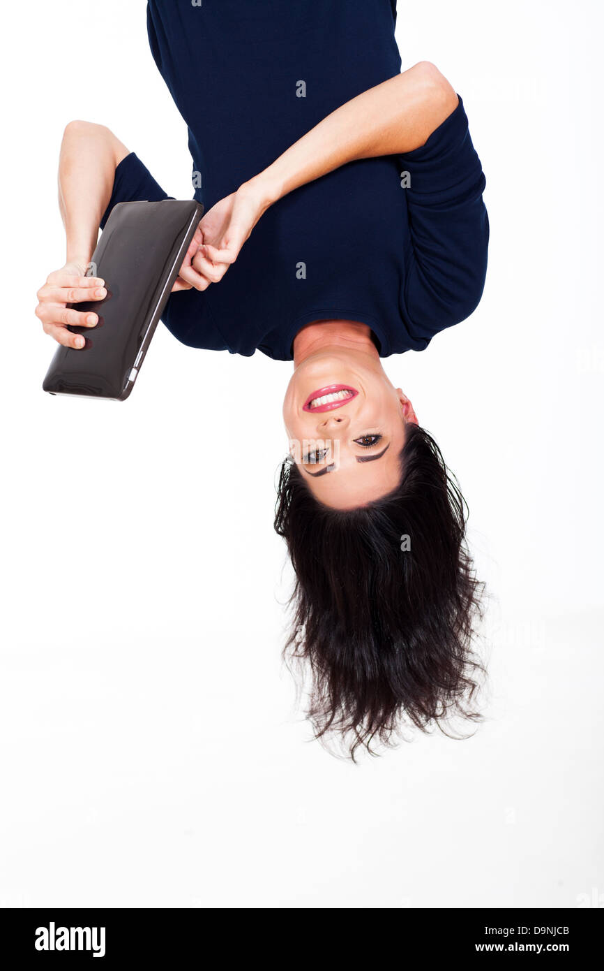 Young woman hanging upside down hi-res stock photography and images - Alamy