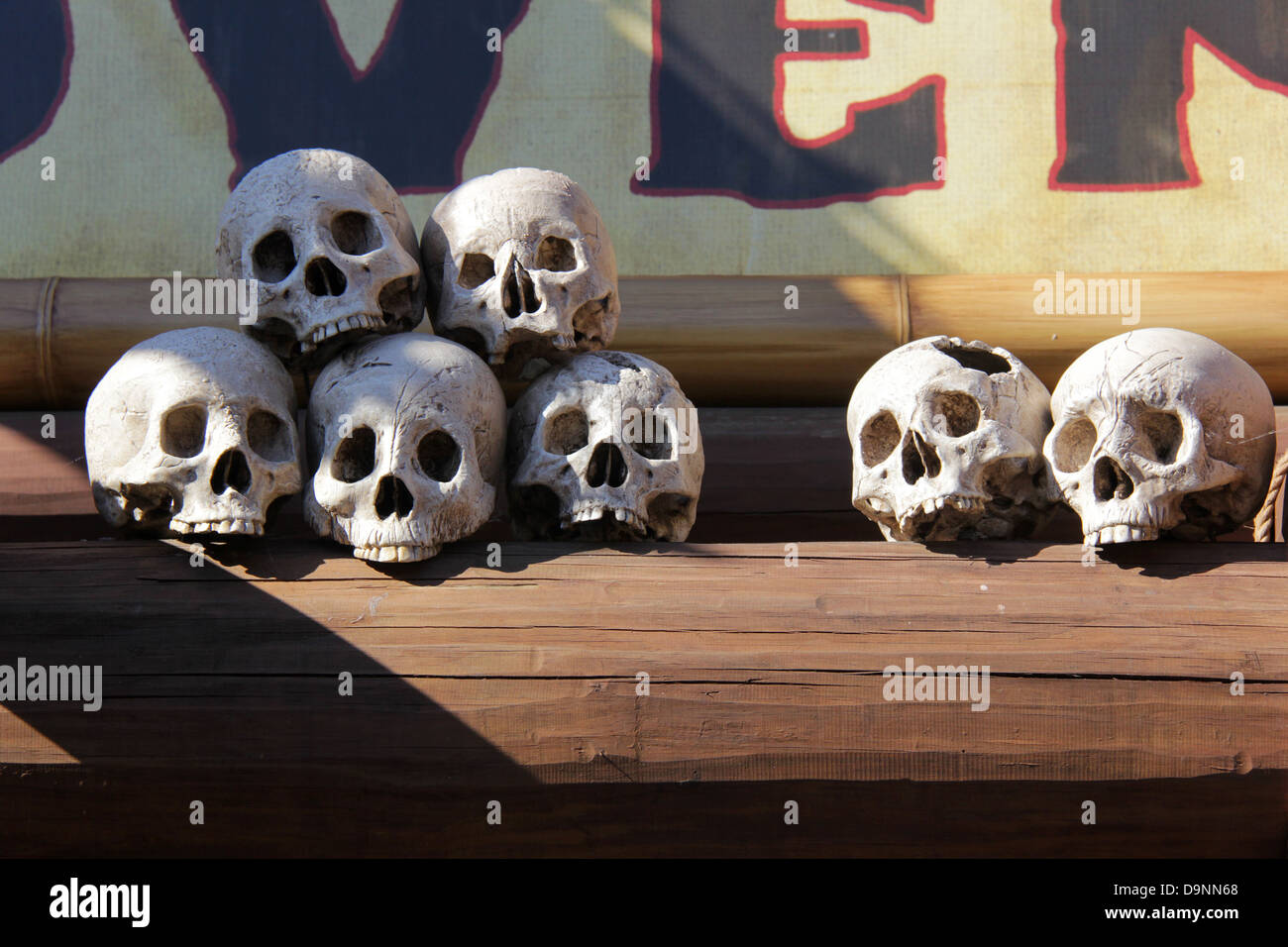 Skulls at the Adventureland sign of Disney World's Magic Kingdom. Stock Photo