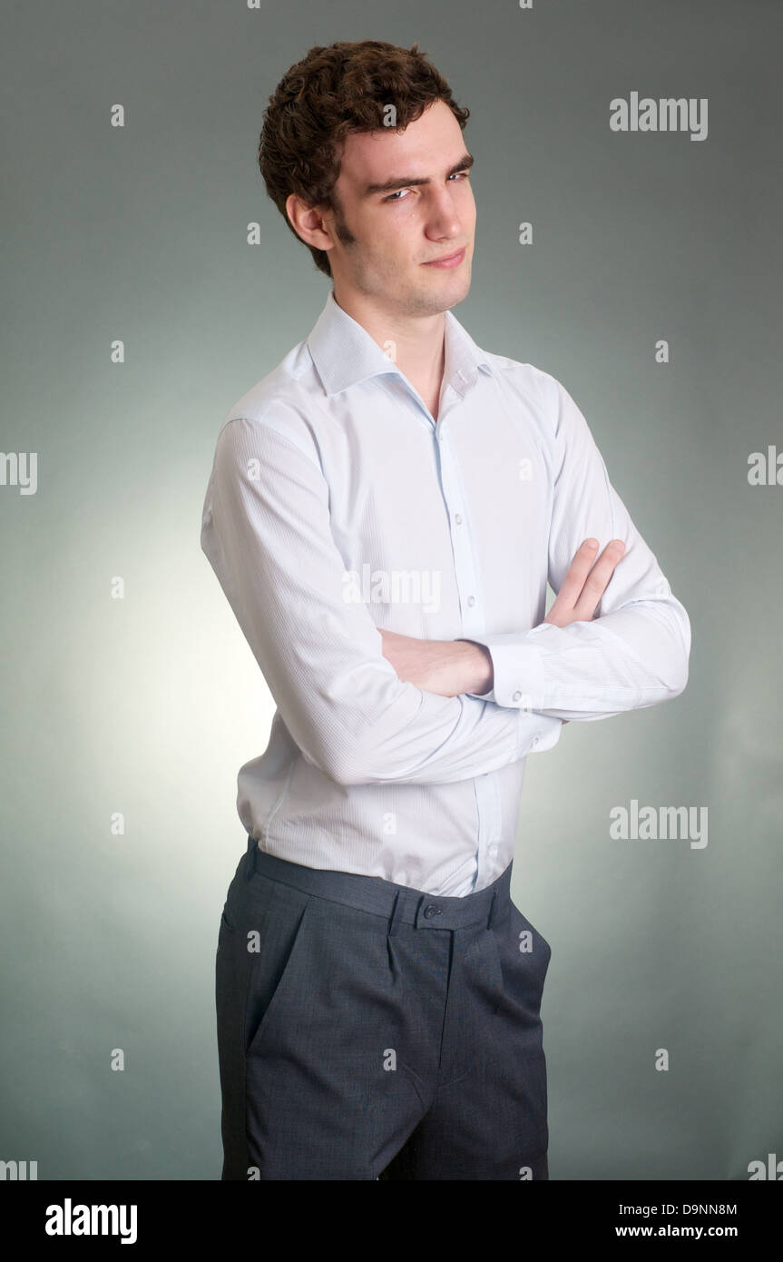arrogant business man with hand in the pocket Stock Photo - Alamy
