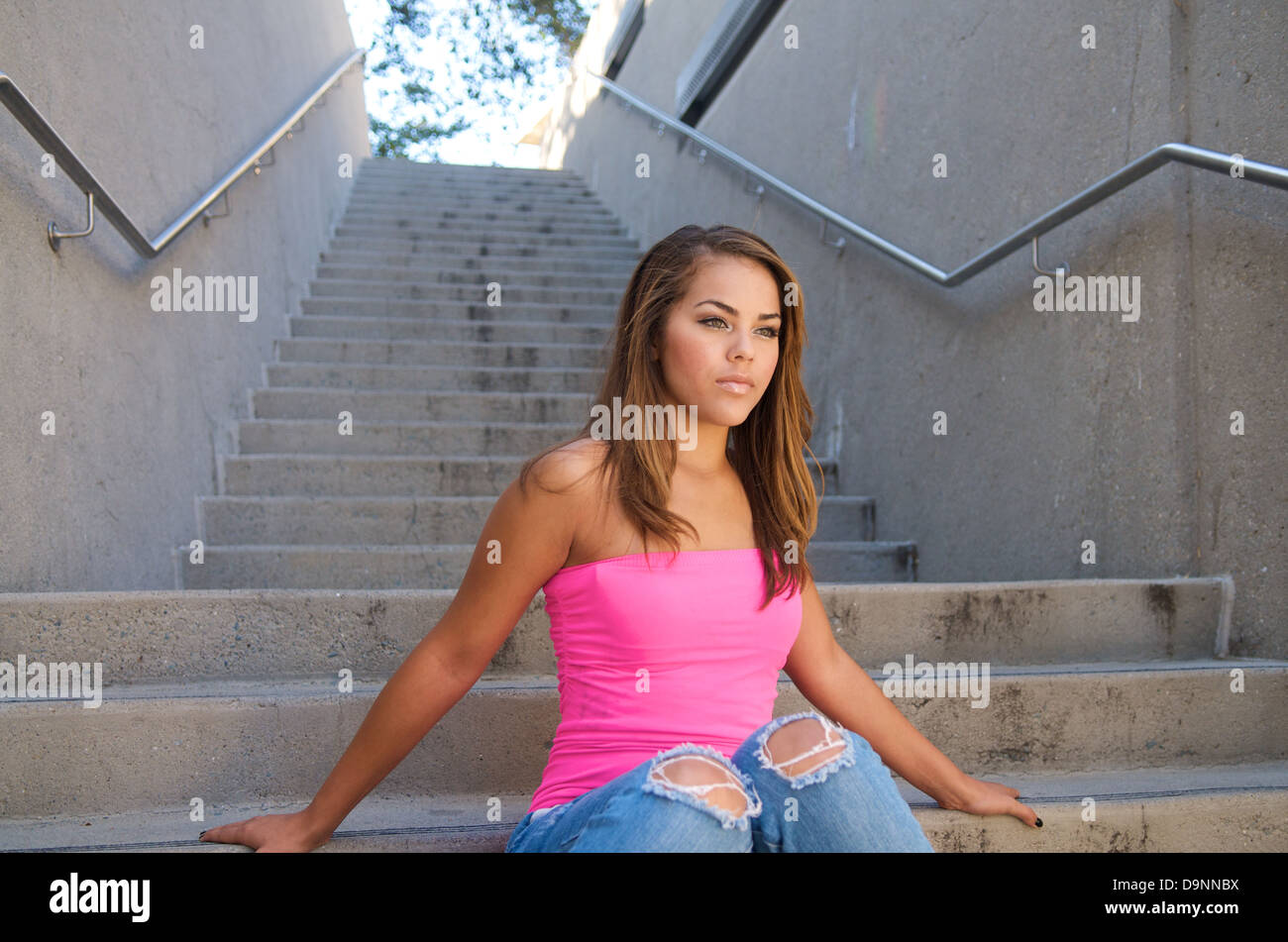 Portrait of beautiful multiracial model in pink. Stock Photo