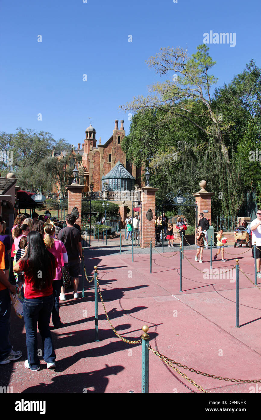 Disney World Magic Kingdom, people in line to attend the Hauted House attraction. Stock Photo