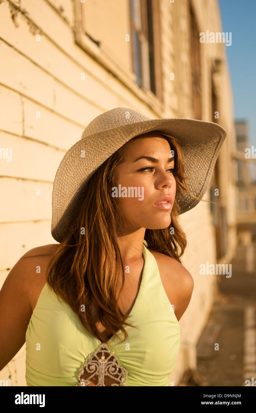 Portrait of beautiful multiracial model with hat. Stock Photo