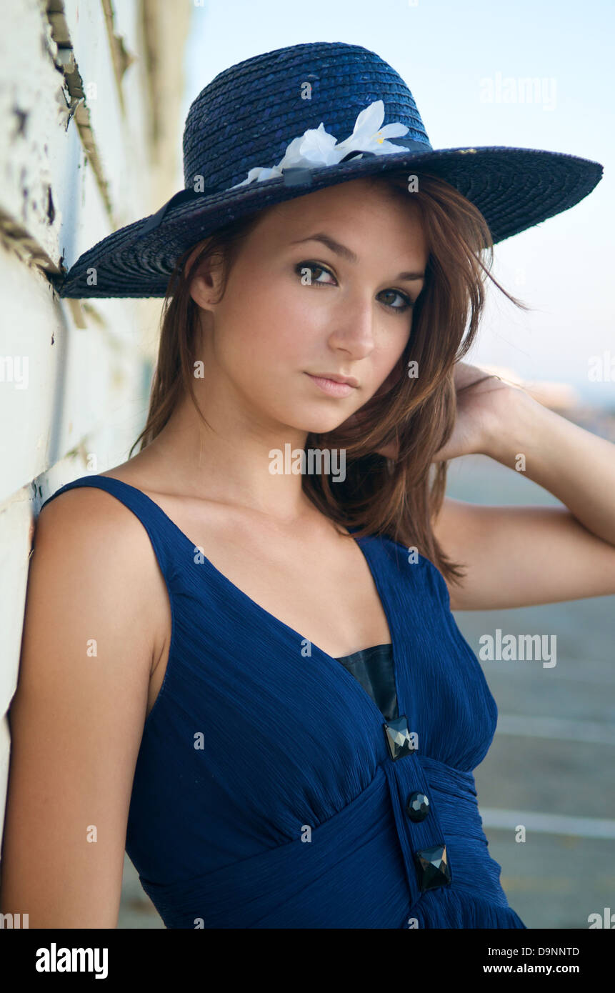 Portrait of beautiful caucasian model outdoor with a hat Stock Photo