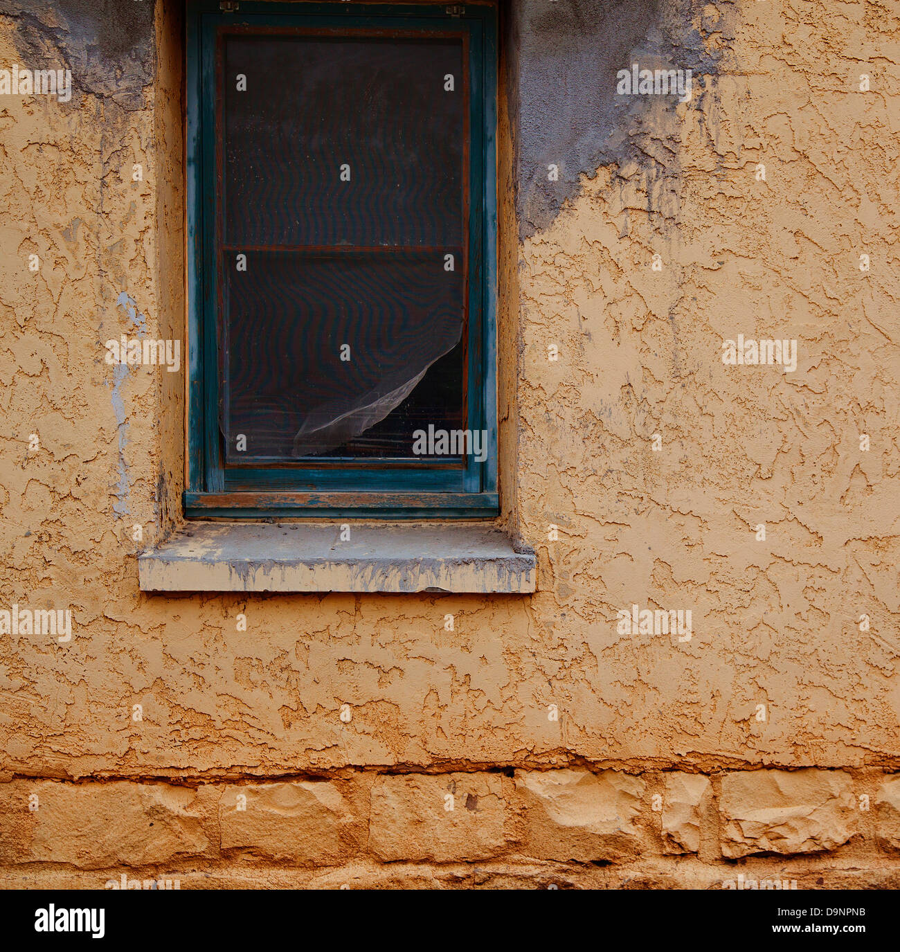 Adobe Building Windows old adobe building with window Stock Photo - Alamy
