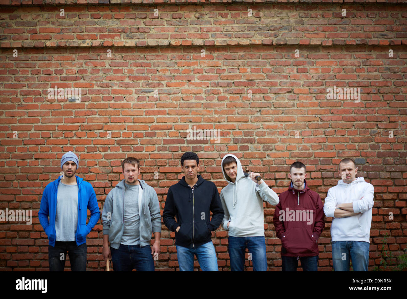 Portrait of several street hooligans or rappers Stock Photo - Alamy
