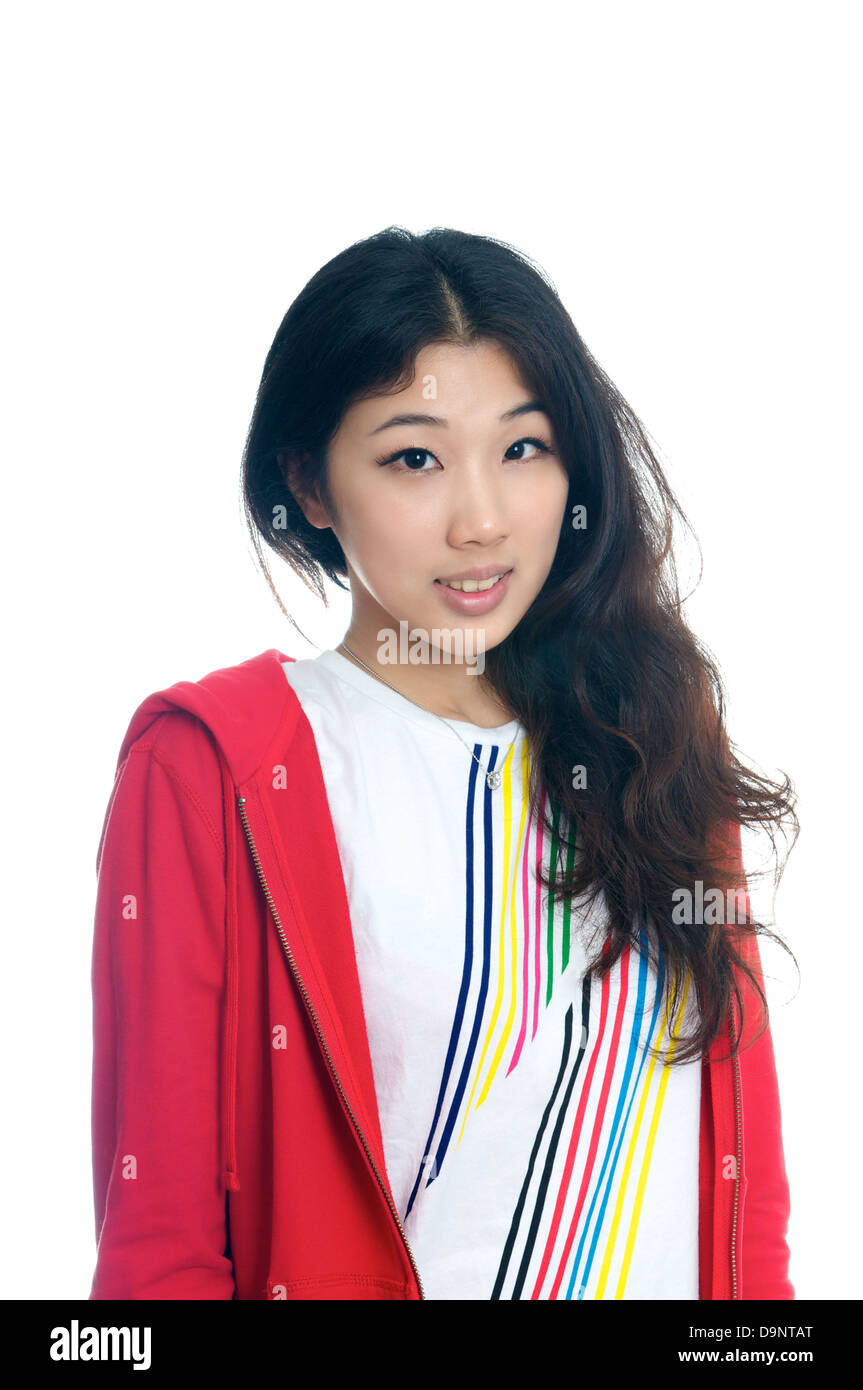 Portrait of beautiful Chinese girl in jeans and sweater Stock Photo
