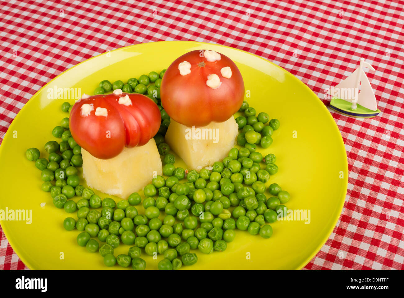 Funny vegetables atractively decorated to draw kids attention Stock