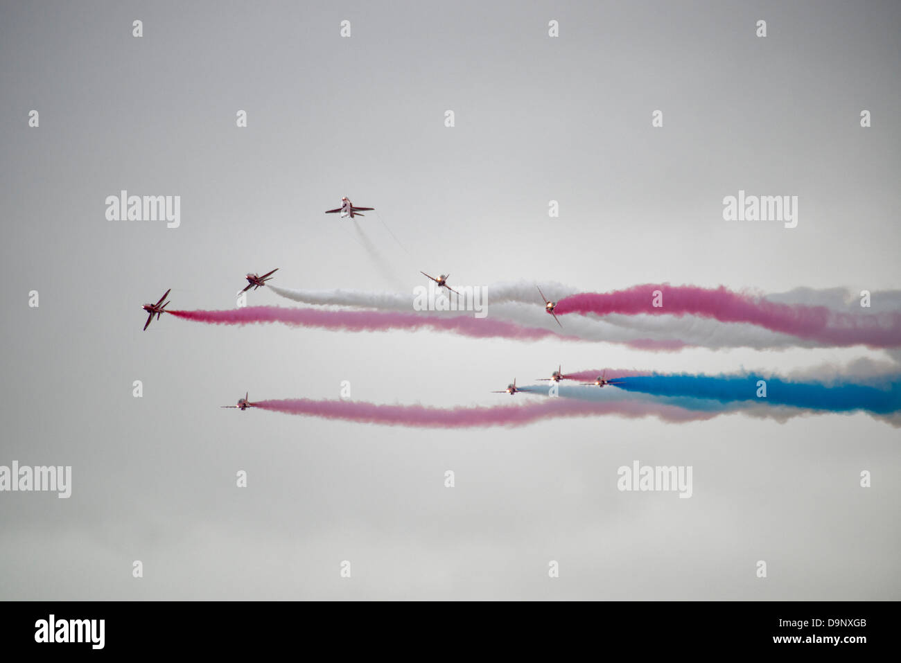 The Red Arrows breaking formation during their exciting aerobatic display at Weston Air Day Weston-Super-Mare Stock Photo