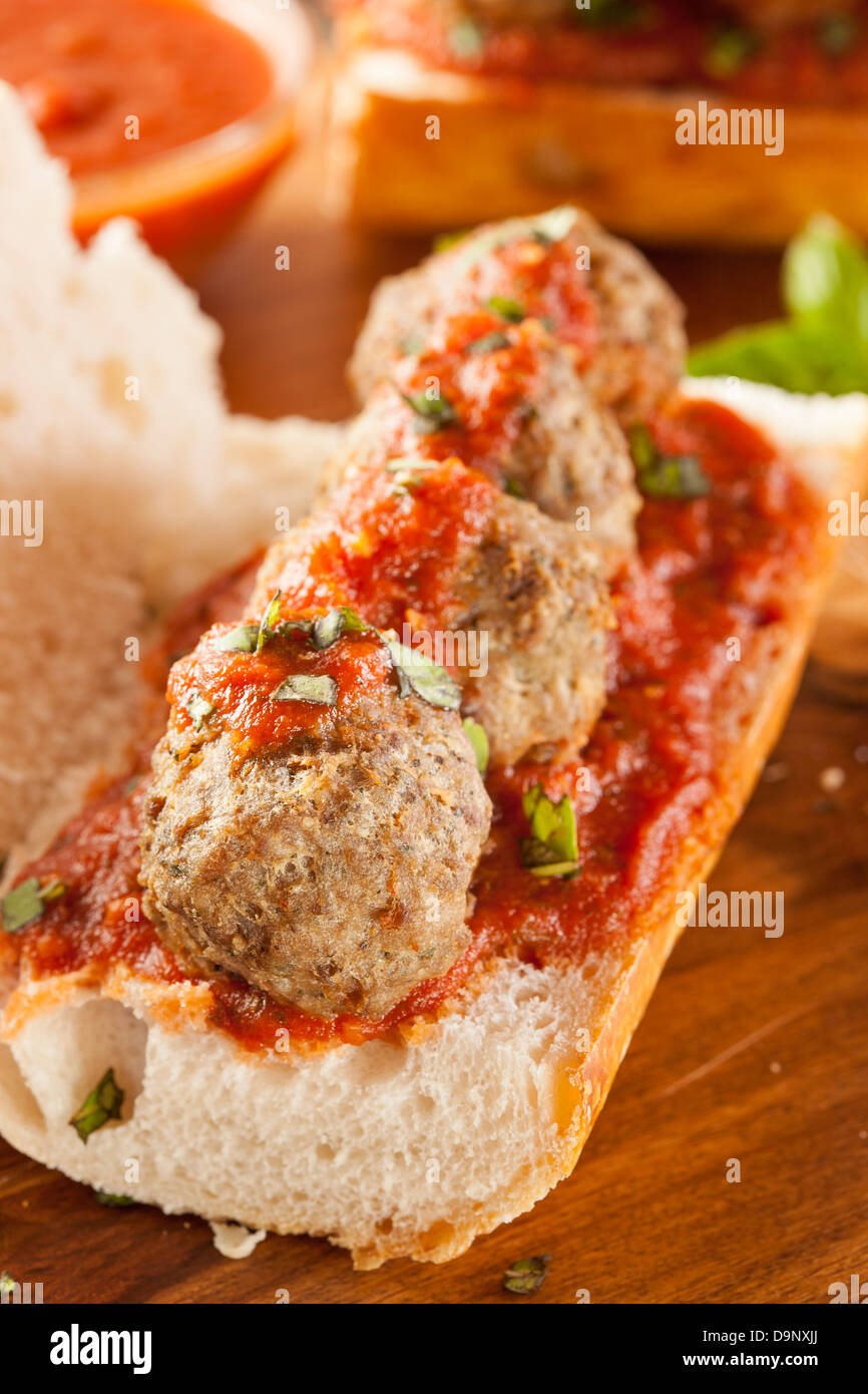 Homemade Spicy Meatball Sub Sandwich with Marinara Sauce and Cheese