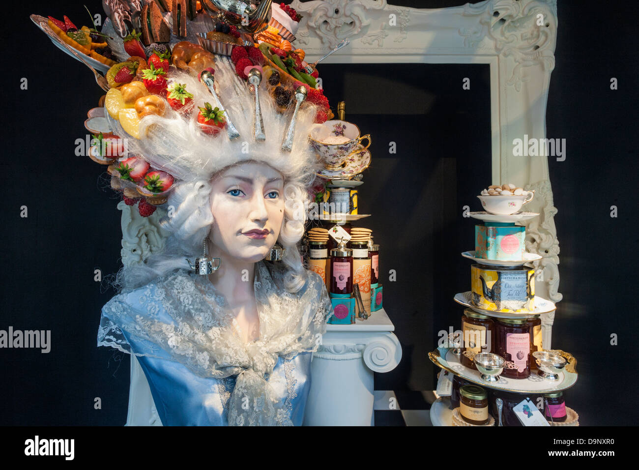 England, London, Piccadilly, Fortnum and Mason Store, Window Display of Mannekin Covered in Food Products Stock Photo
