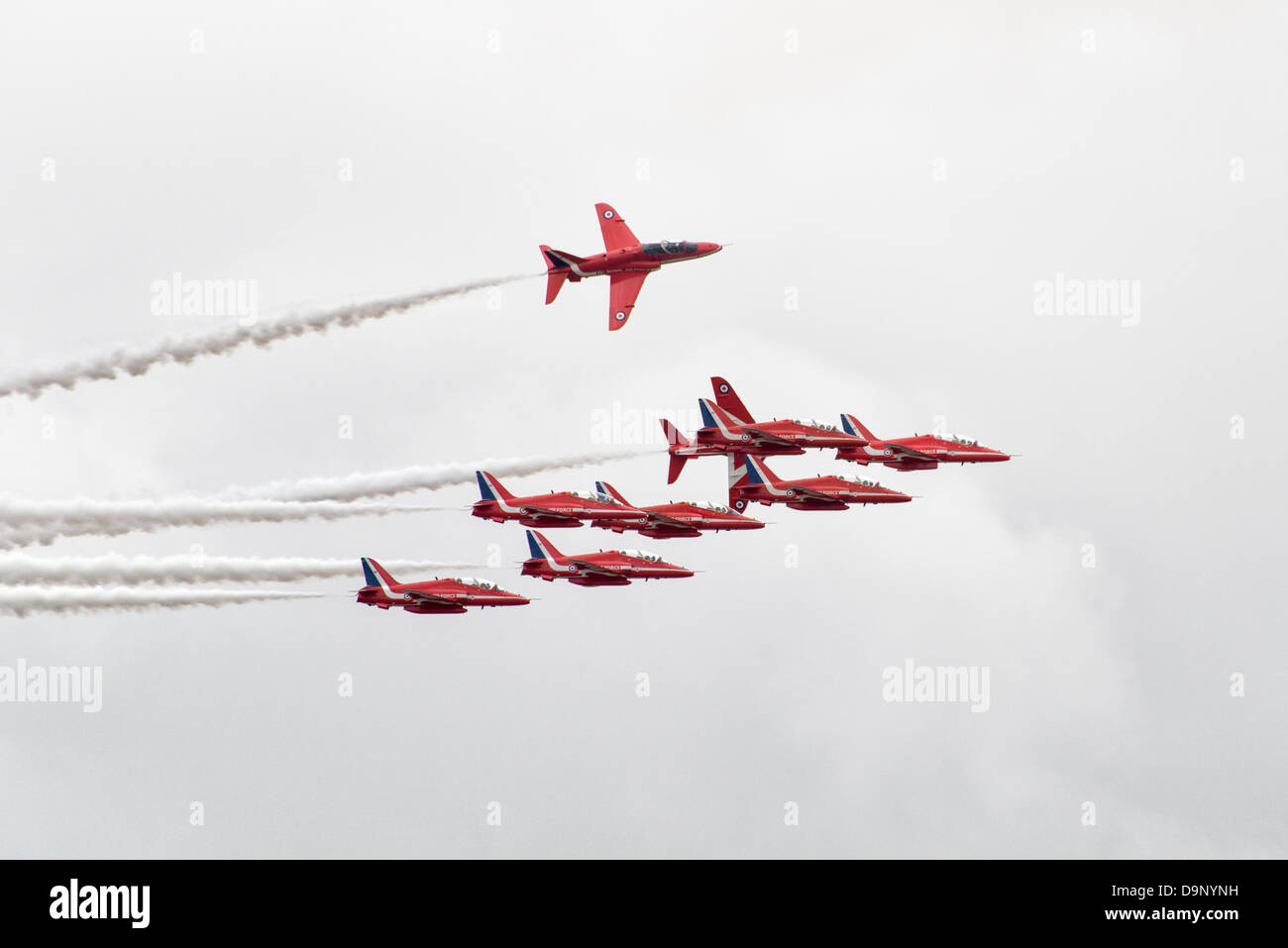 The Red Arrows break formation during their exciting aerobatic display at Weston Air Day Weston-Super-Mare. Stock Photo