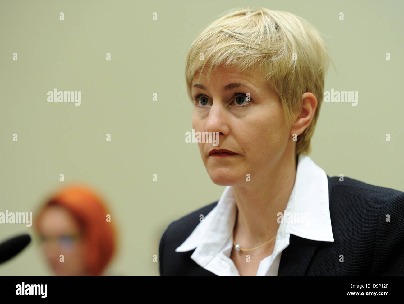 Anja Sturm, lawyer of the defendant Zschaepe, stands inside the court room in Munich, Germany, 24 June 2013. The trial of the murders and terror attacks of German terror cell 'National Socialist Underground' (NSU) continues at the Higher Regional Court in Munich. The court has called witnesses. Photo: Tobias Hase Stock Photo