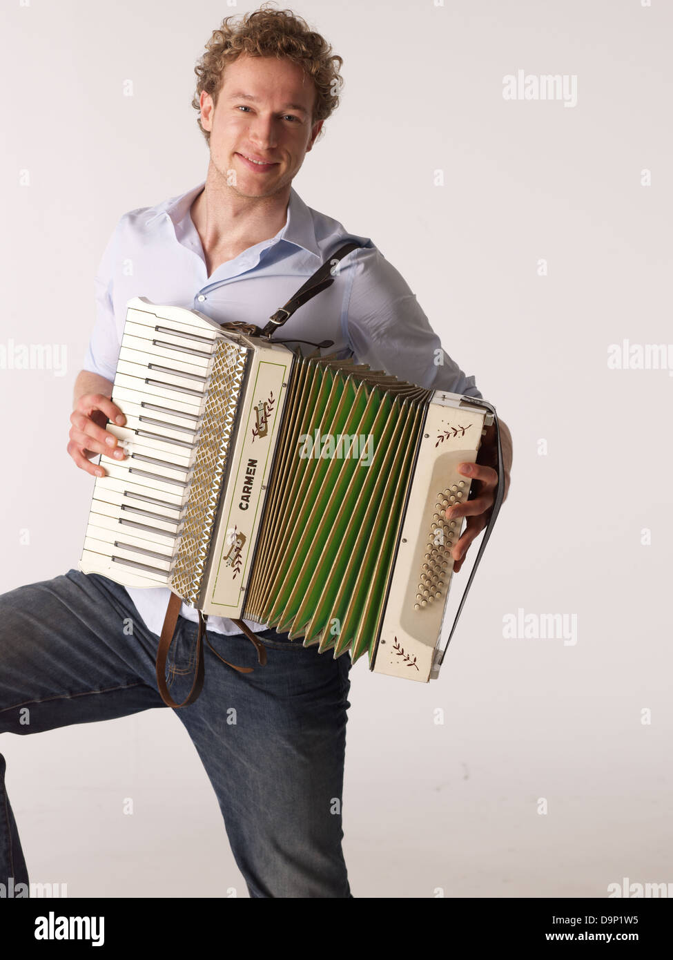 Man playing accordion Stock Photo Alamy