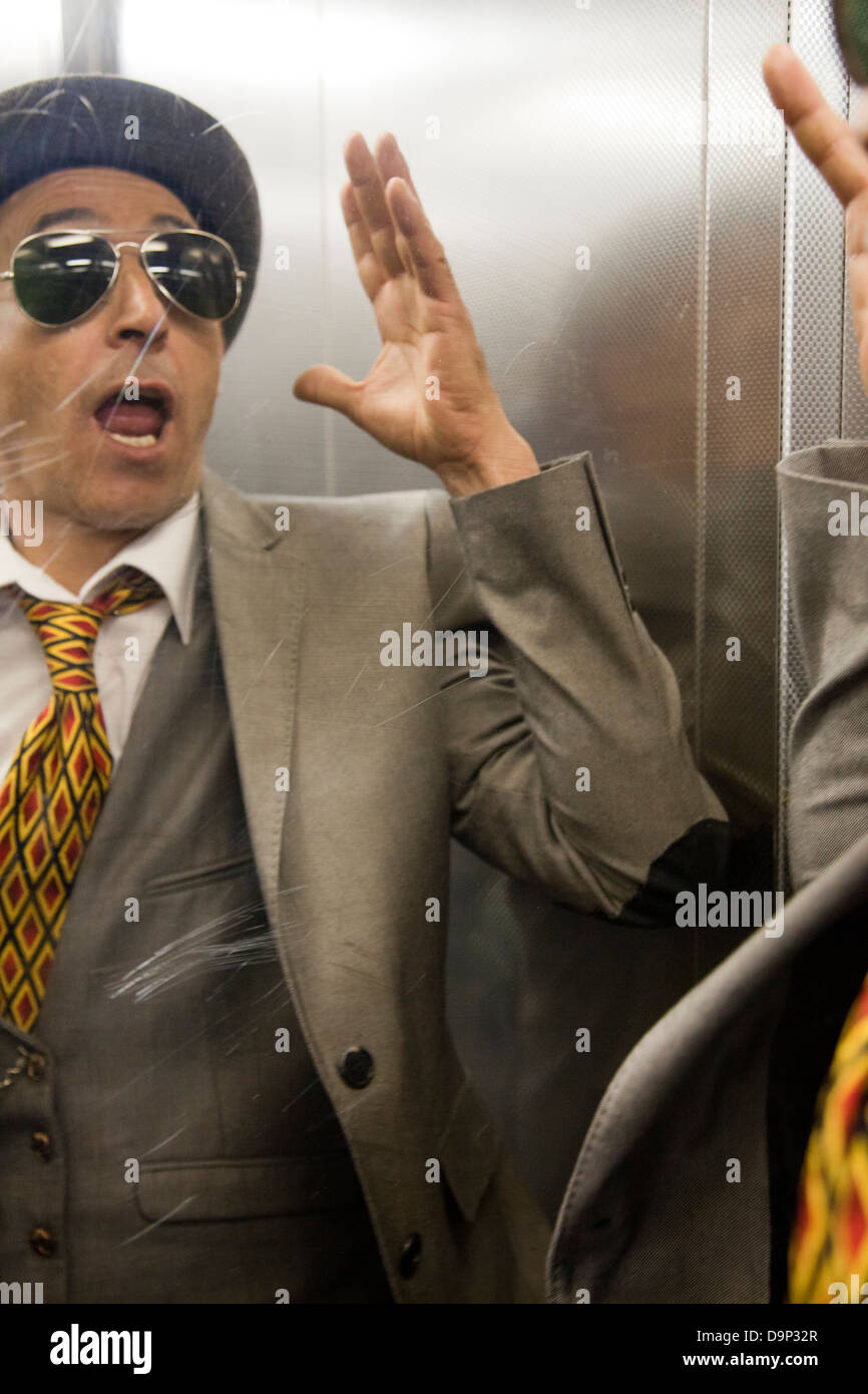 Dandy Man in Elevator Stock Photo