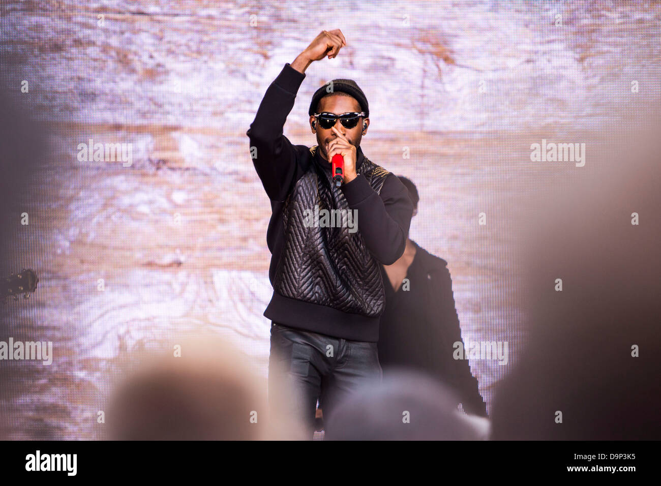 Tiny Tempah performs at the ONE Agit8 campaign, outside Tate Modern, London. Stock Photo