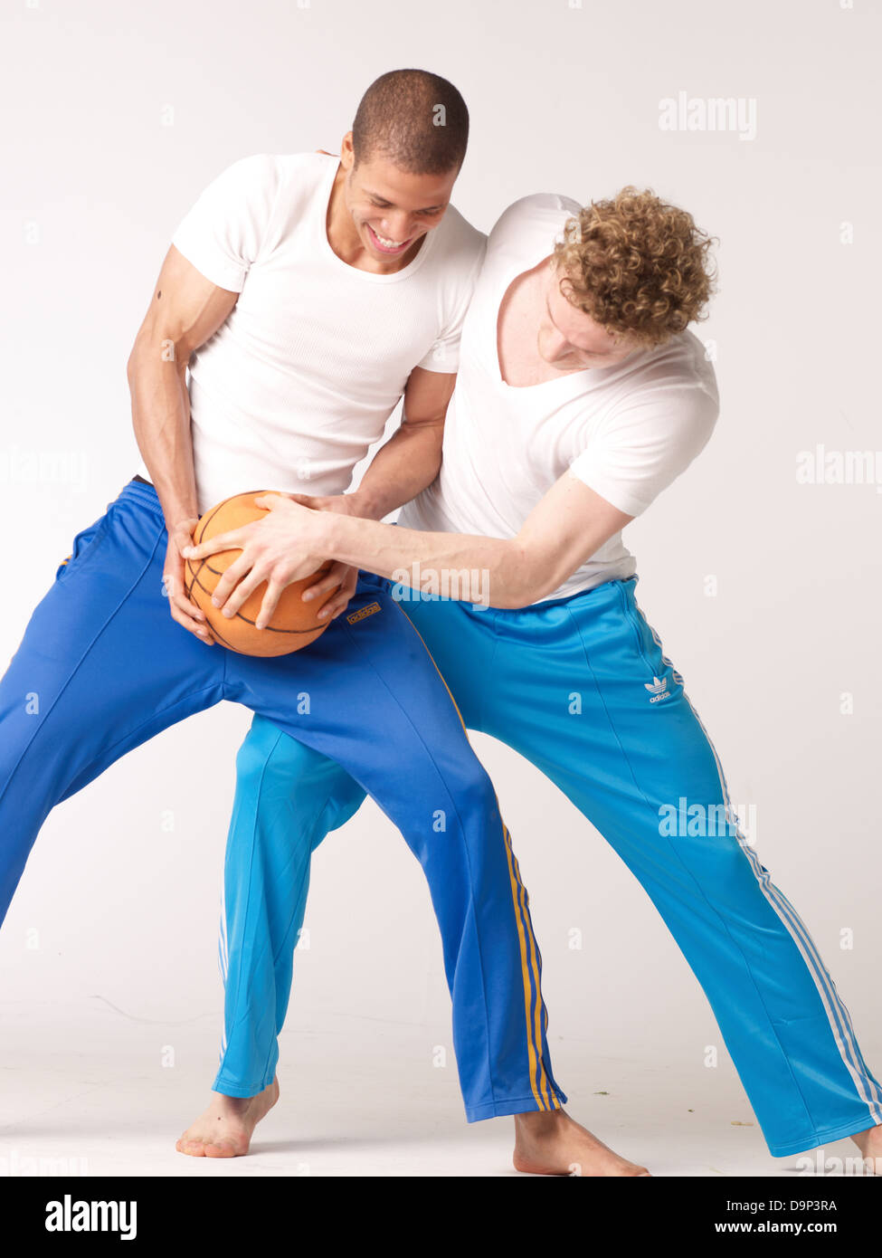 Two friends playing basketball Stock Photo - Alamy