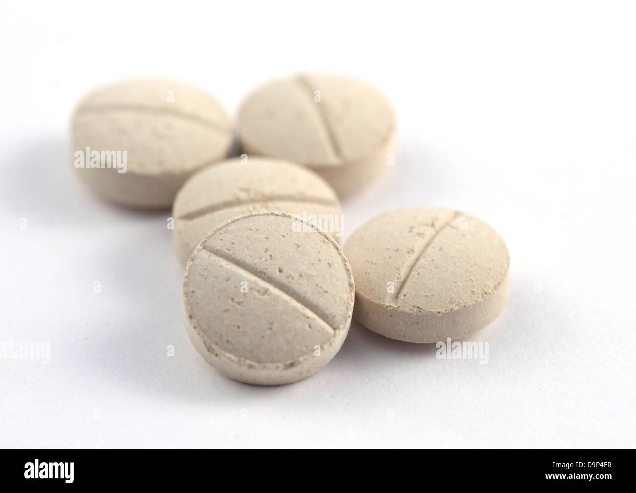 Medical health remedies, a pile of pills used in medication Stock Photo