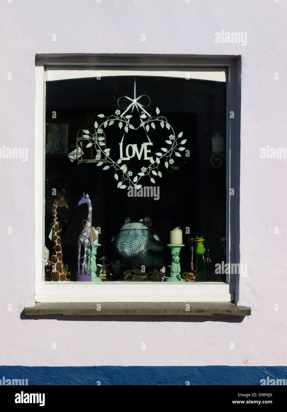 Love sign in a shop window, UK 2013 Stock Photo