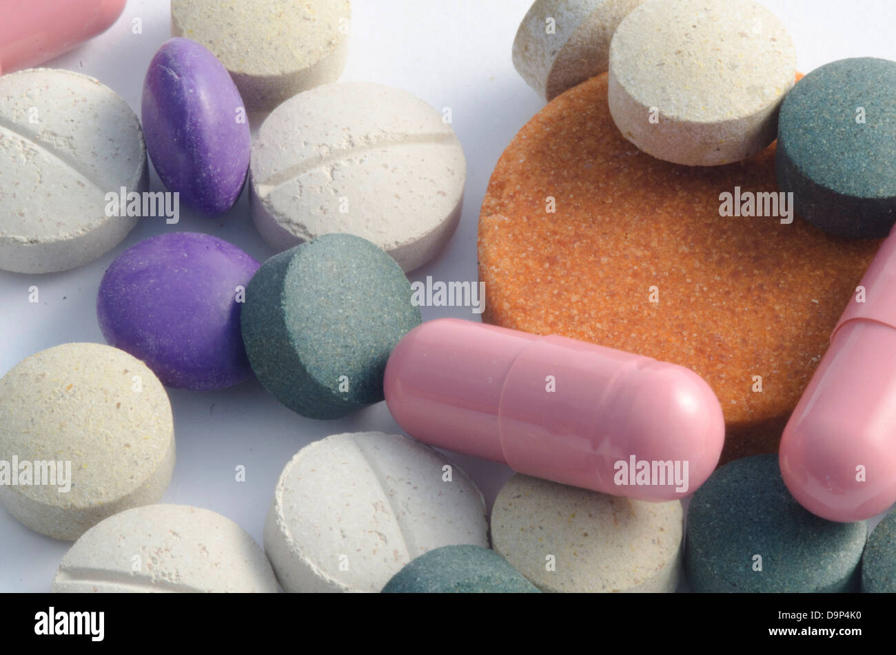 Medical health remedies, a pile of pills and capsules medication Stock Photo