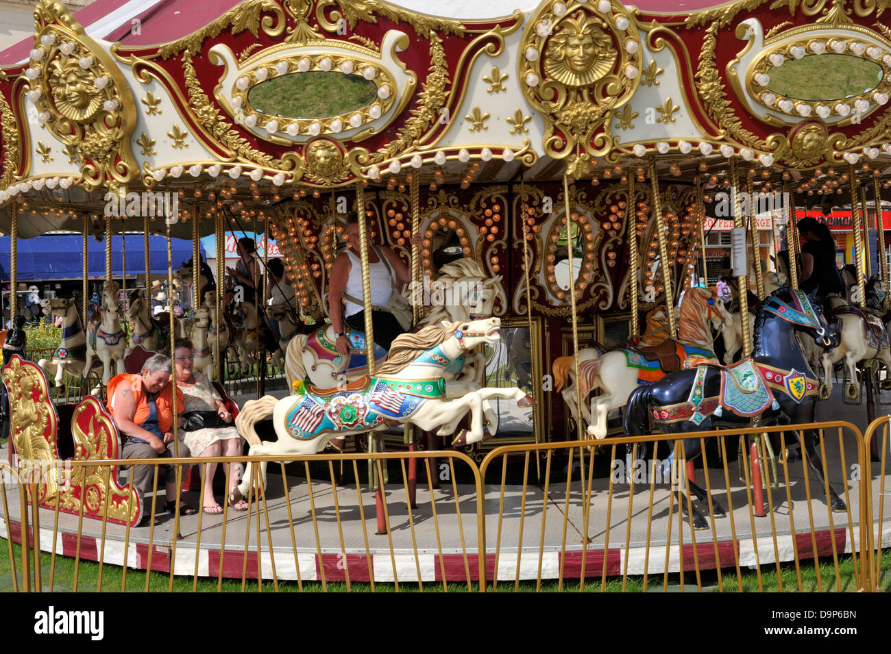Traditional carousel with horses at Weston Super Mare, UK Stock Photo