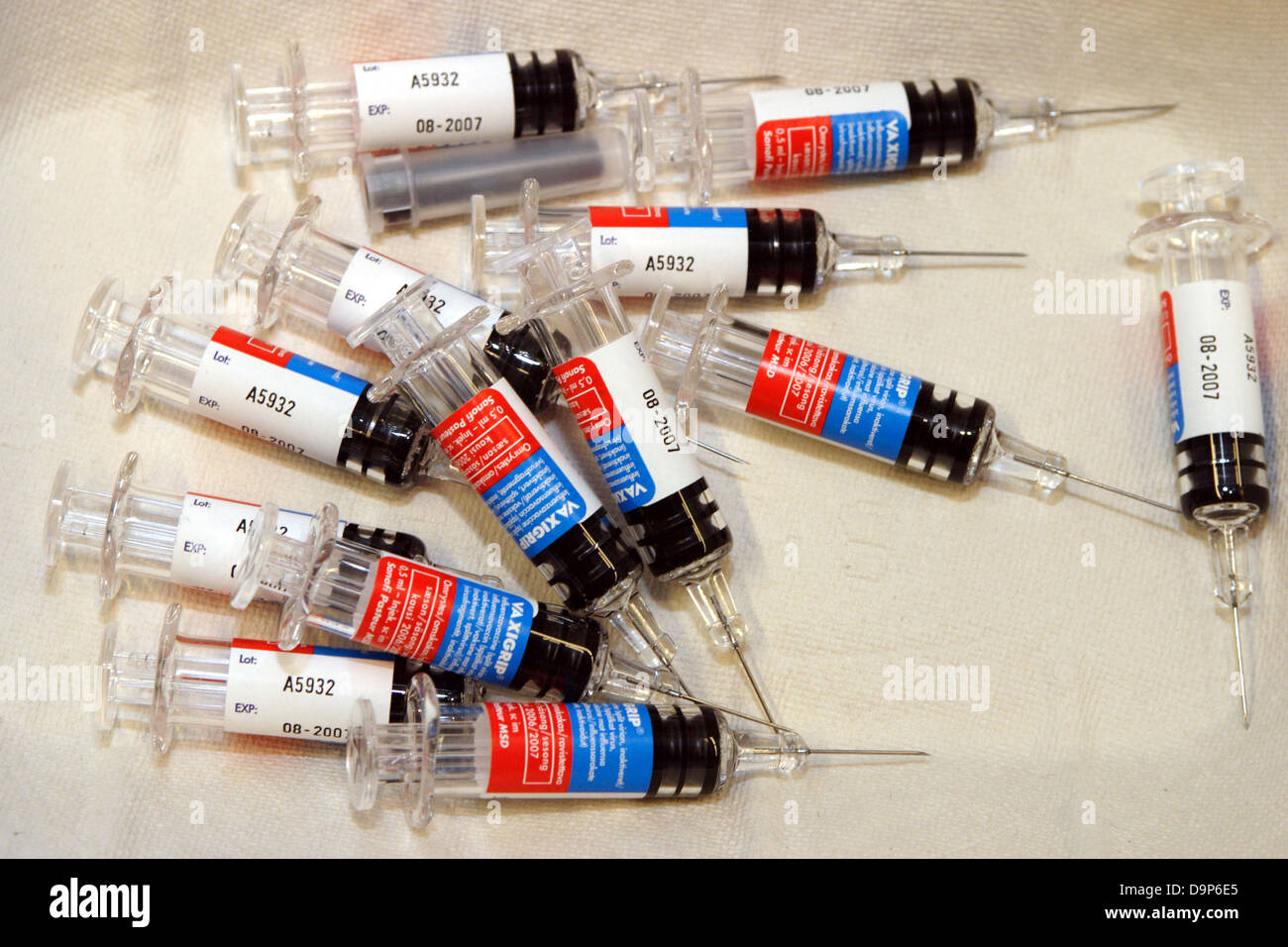 Vaccination syringes in a bowl Stock Photo