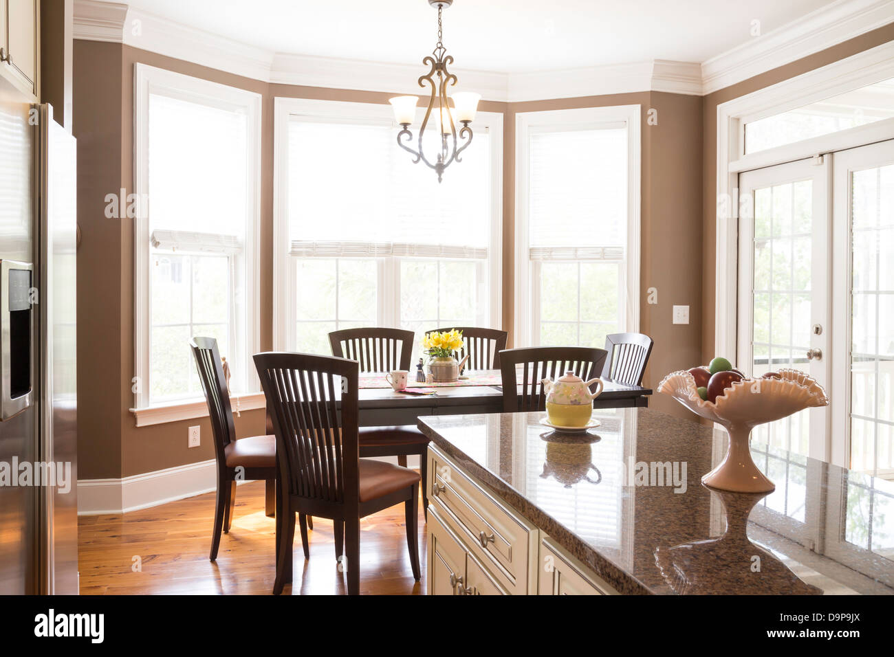 Luxury Showcase Kitchen Island Looking into Dining Area, USA Stock Photo
