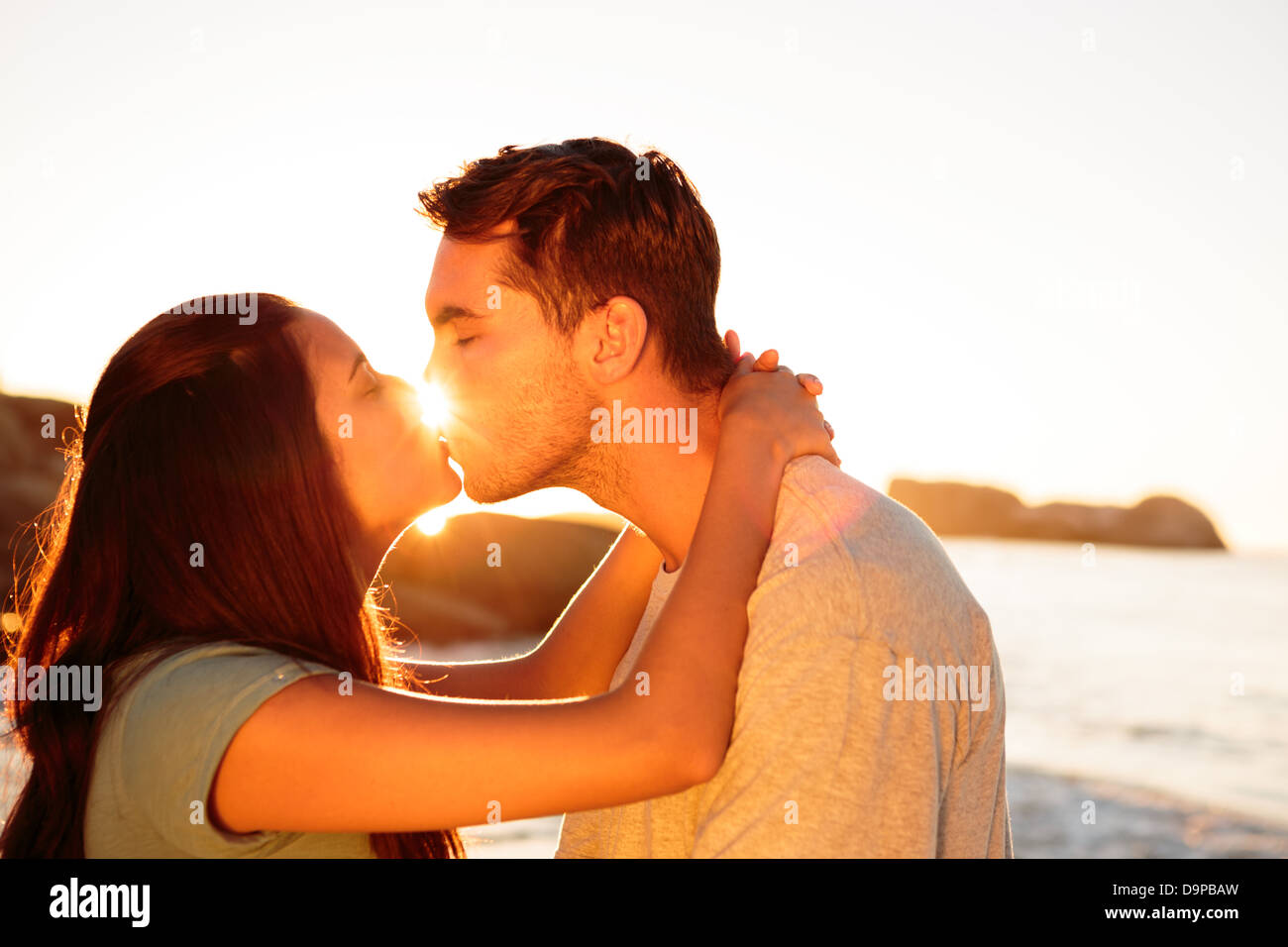 Couple hugging other on beach hires stock photography and images Alamy