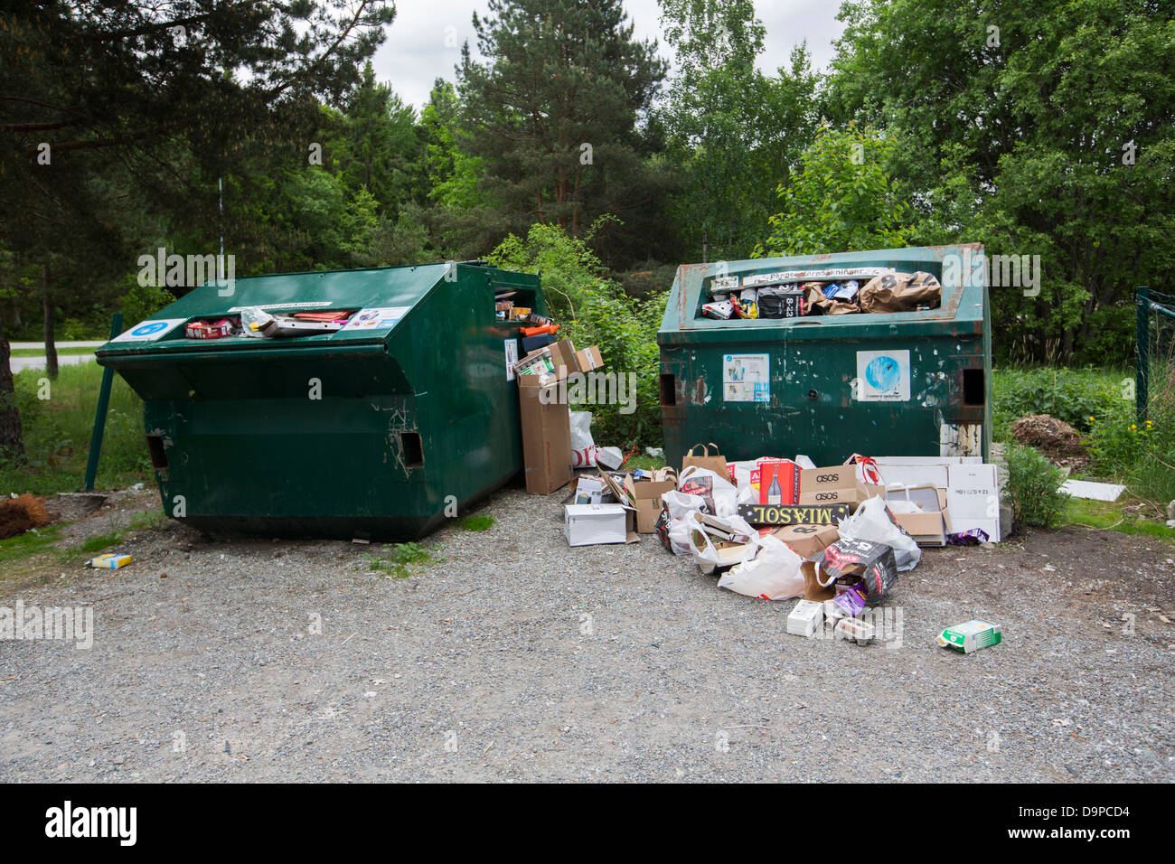 Rubbish outside container Stock Photo