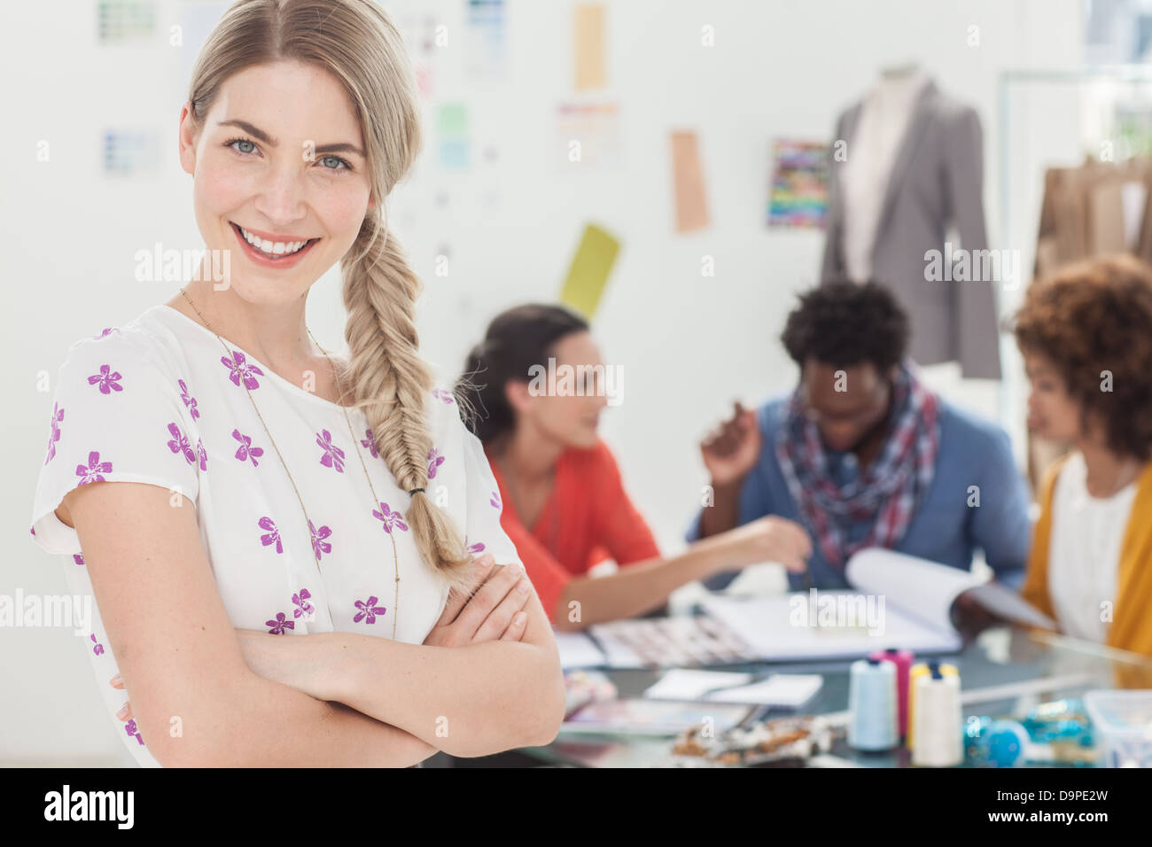 Business woman standing folded arms hi-res stock photography and images ...