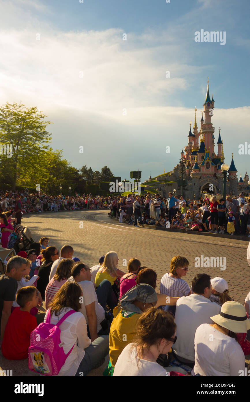 People waiting for the Disney Parade at Disneyland Paris Stock Photo