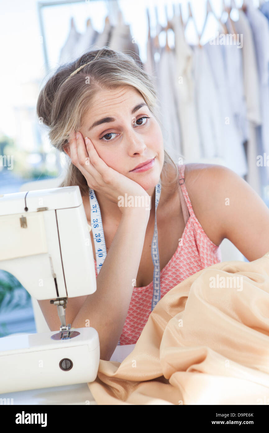 Fashion designer getting bored Stock Photo