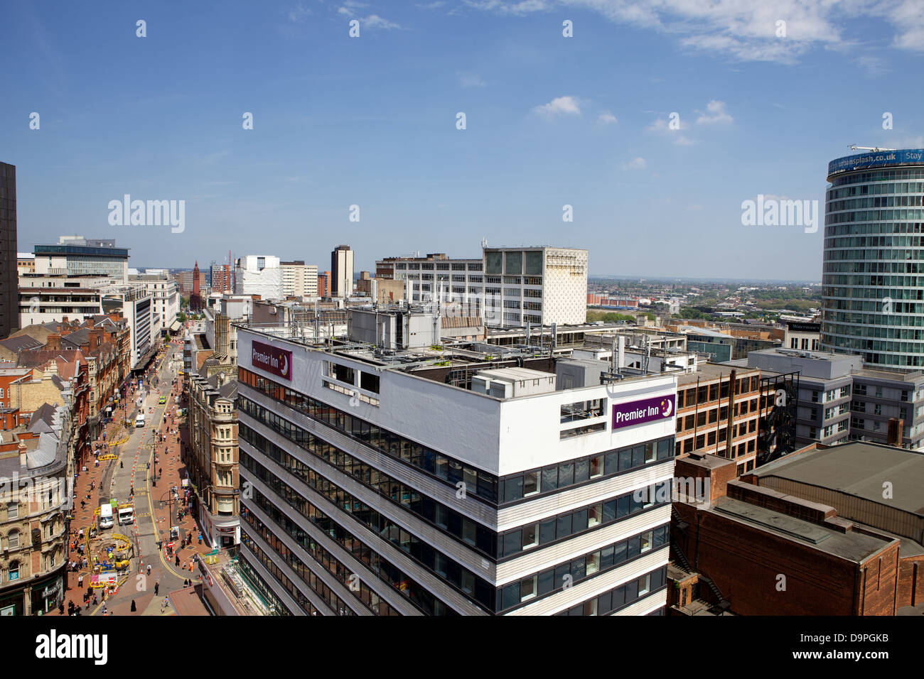 Looking up Corperation Street in Birmingham City Centre past Premier Inn Stock Photo