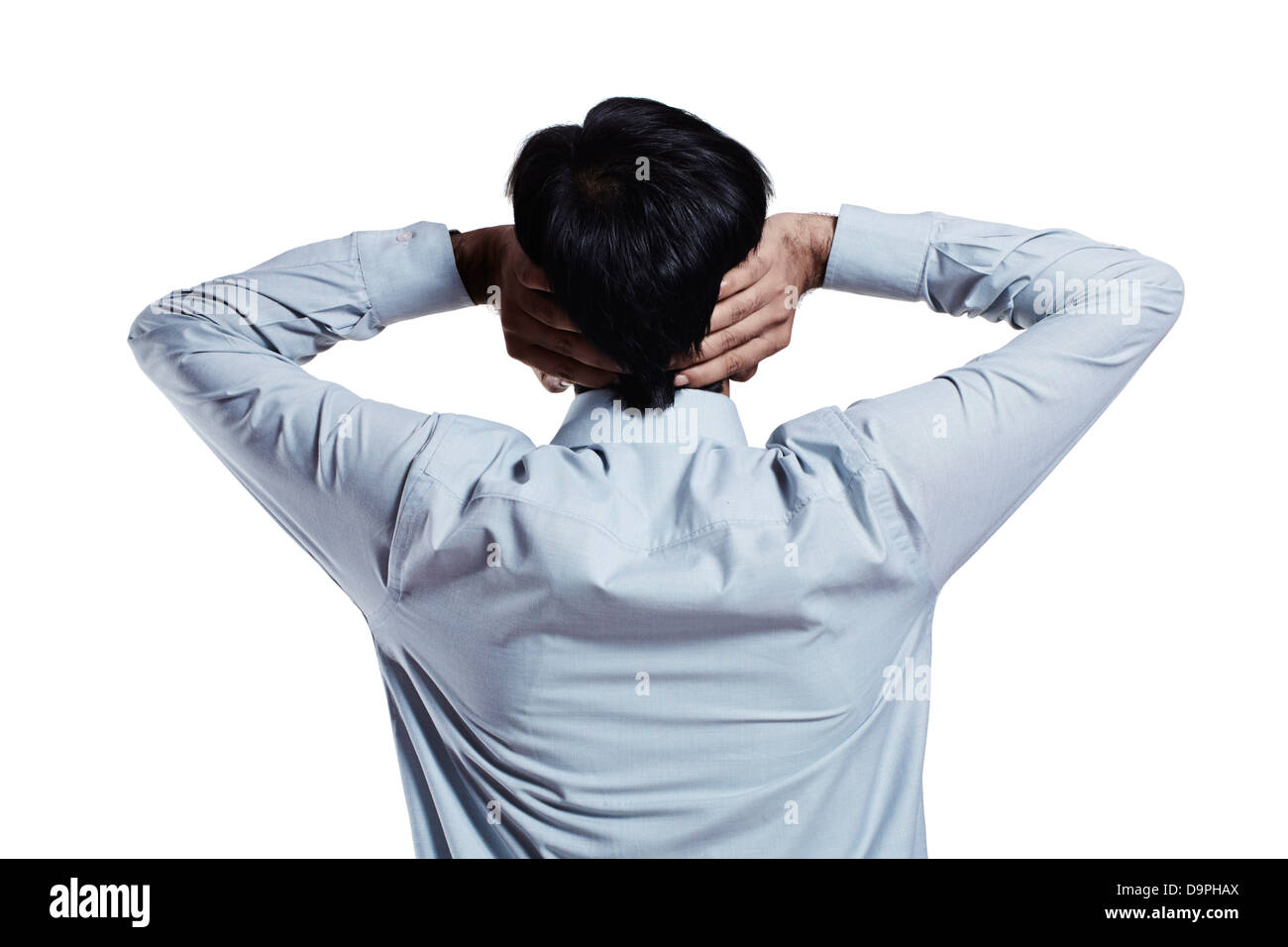 Rear view of a businessman with hands covering ears Stock Photo Alamy