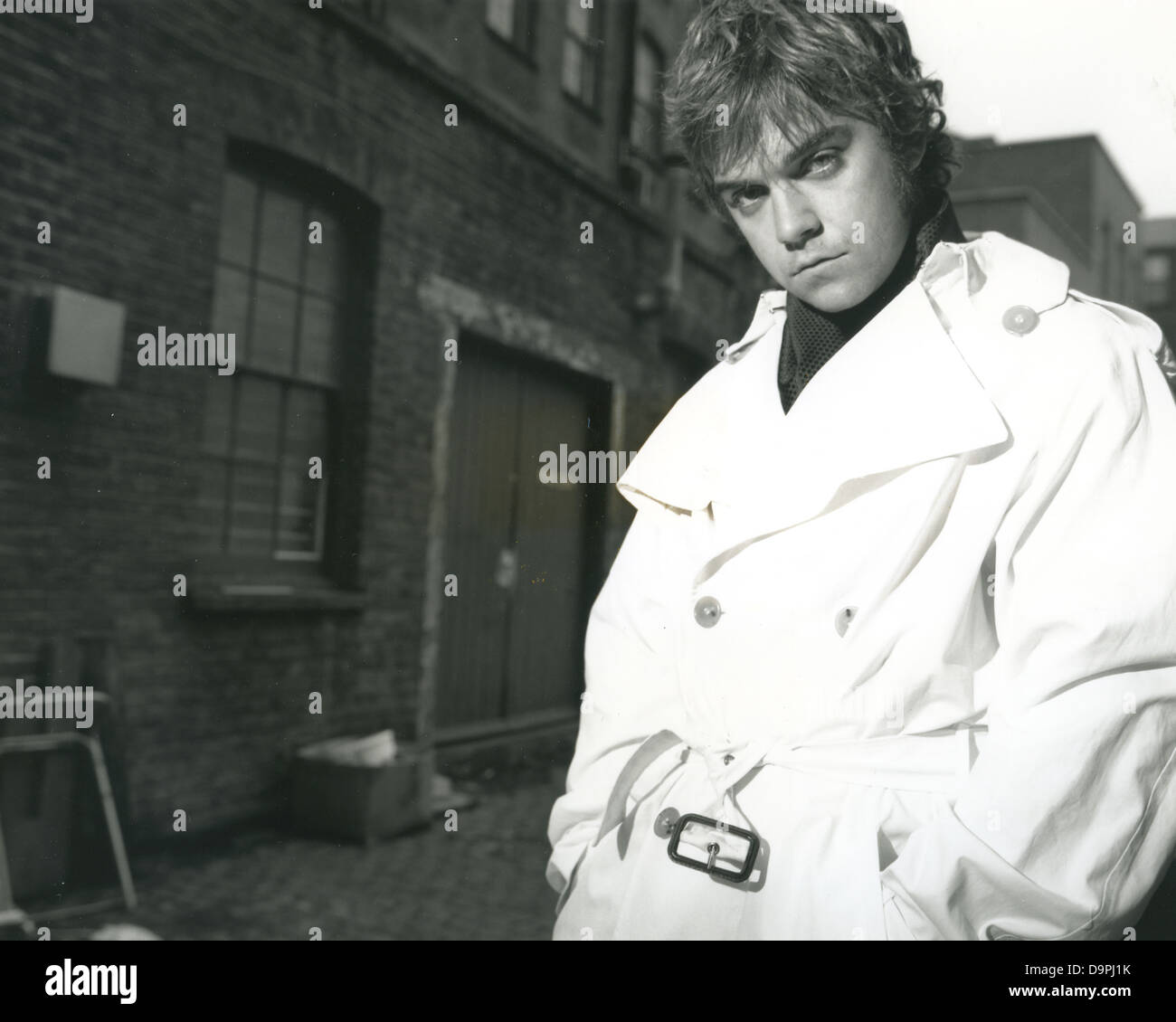 ROBBIE WILLIAMS Promotional photo of UK pop singer about 1996 Stock 
