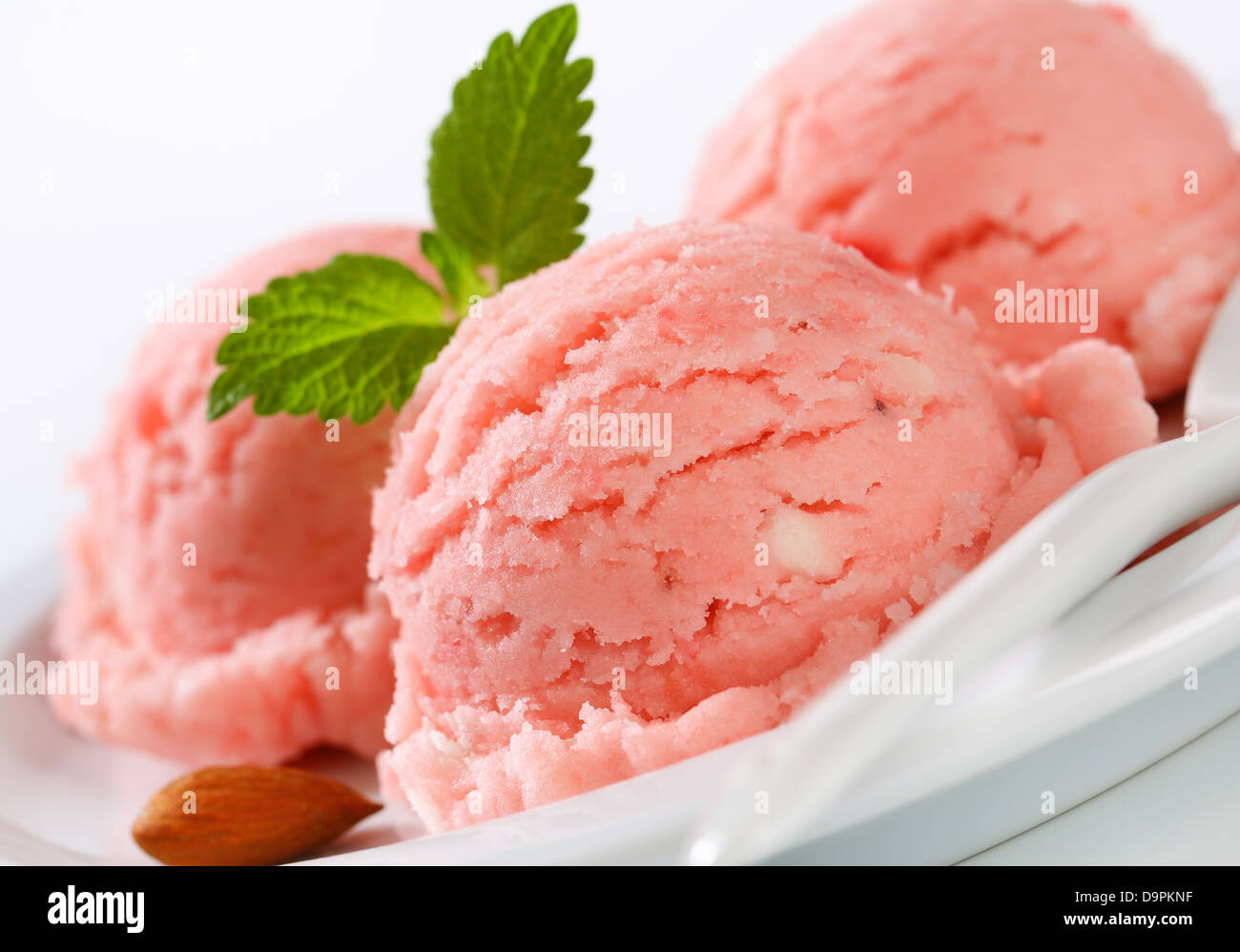 Scoops of pink fruit sherbet Stock Photo - Alamy