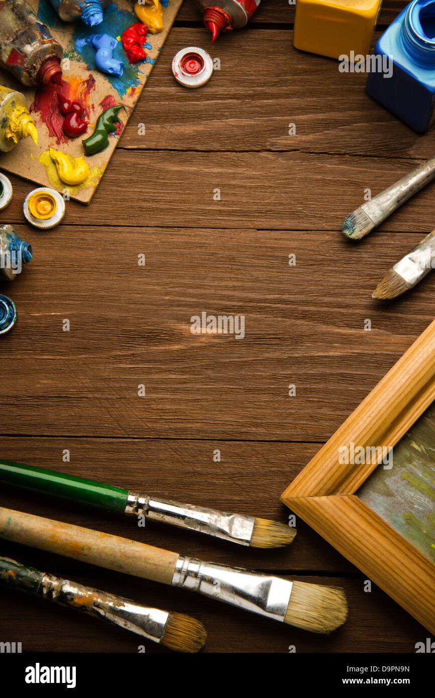 brush and painting on wood background Stock Photo - Alamy