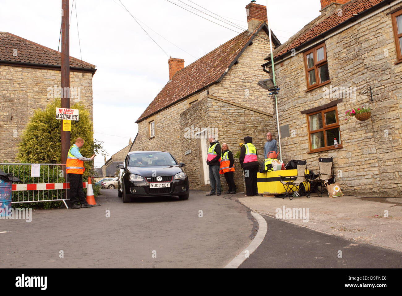 Pilton Somerset UK June, 2013. The Glastonbury Festival takes place at Pilton - the village is now patrolled by stewards and a no go zone for music fans Stock Photo