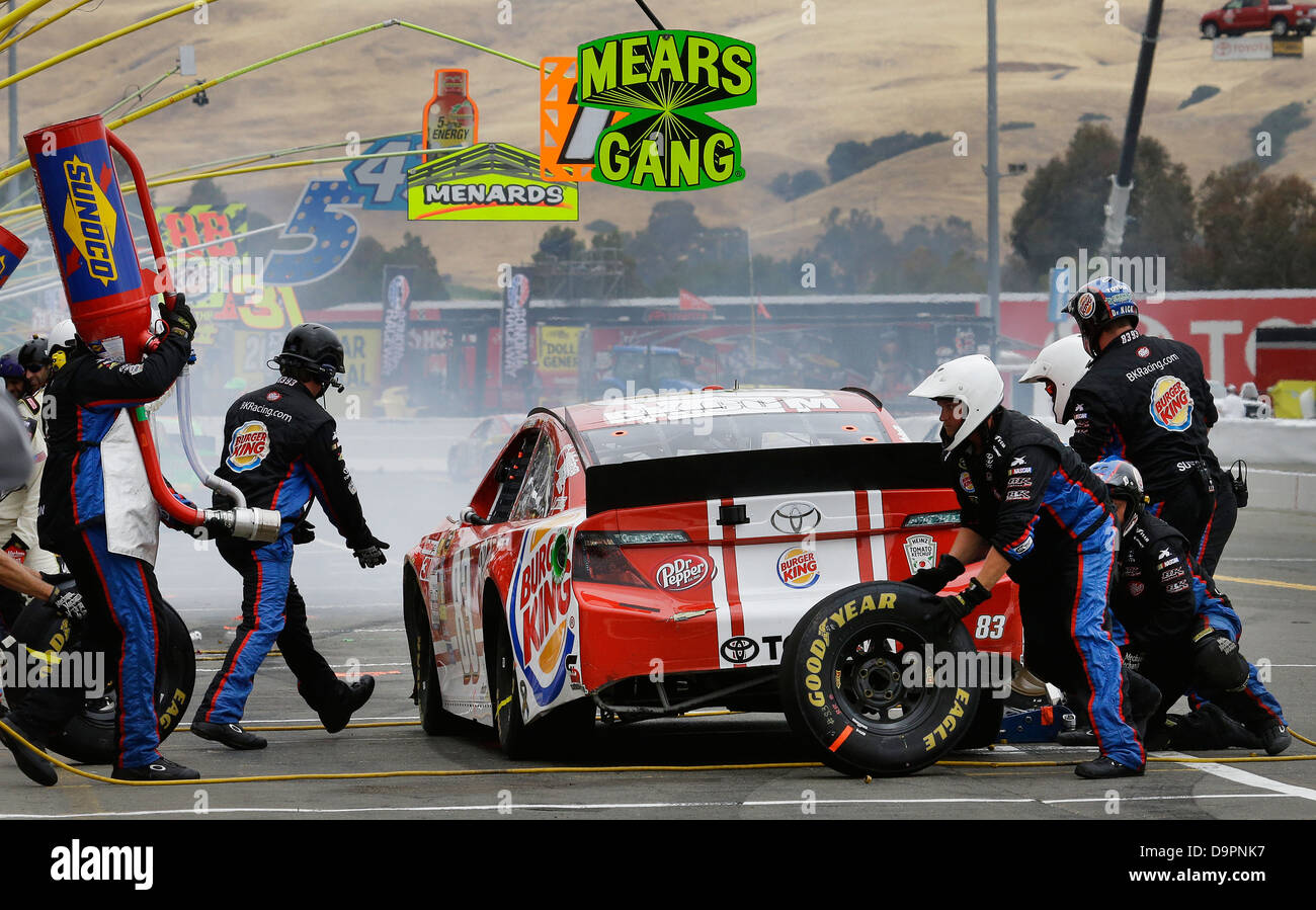NASCAR PIT STOP GAS SPEED TIRES RACE CAR Stock Photo