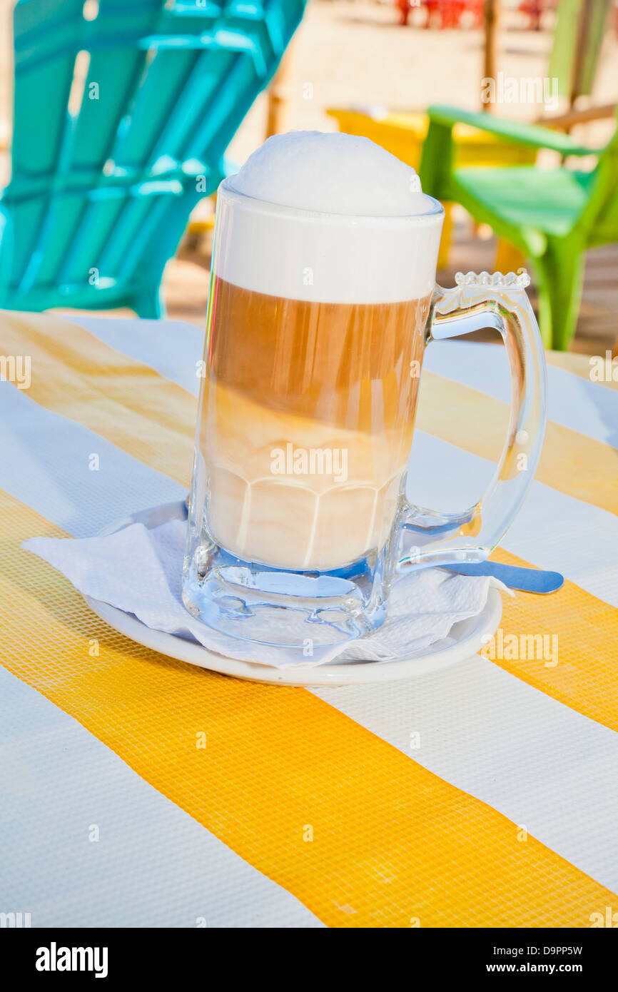 Colorful drink on seaside table Stock Photo
