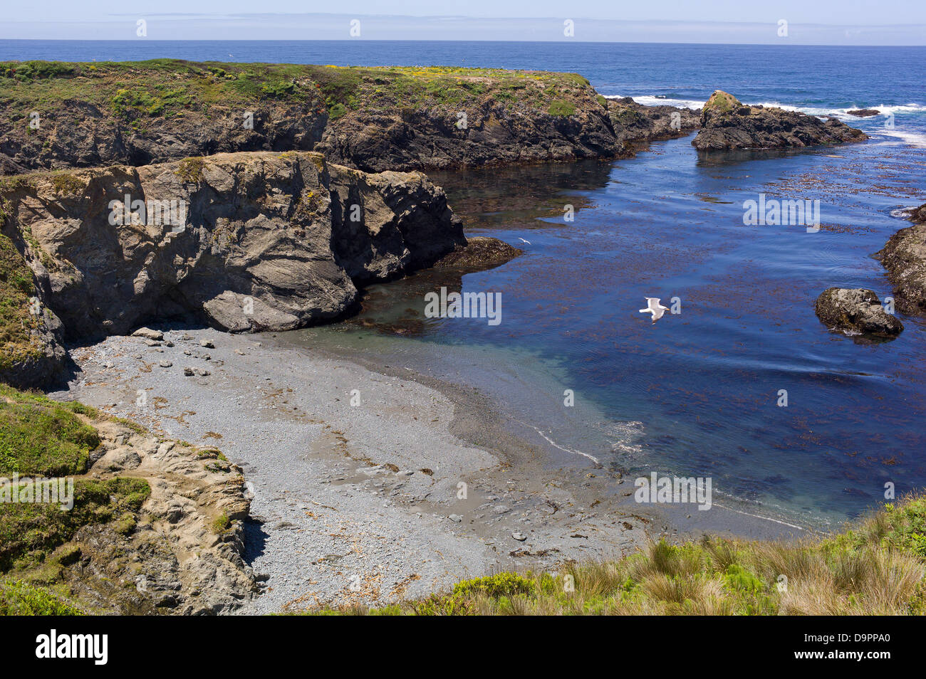 Pacific Ocean cove lagoon rocky beach sea cliff  water sandy beach Summer of 42 film location cooling beauty tranquil beautiful Stock Photo