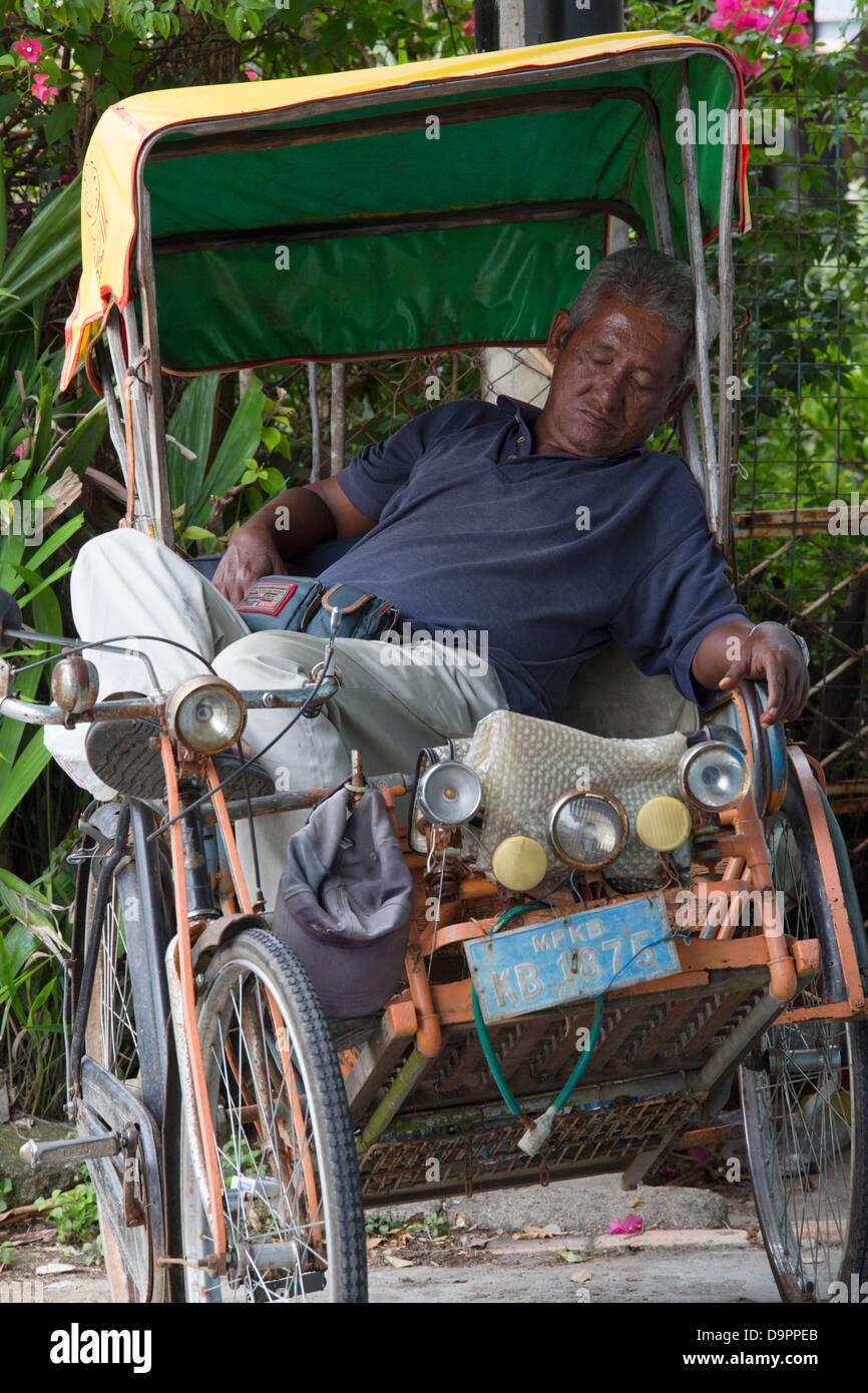 Tricycle driver asleep, Kota Bharu, Kelantan, Malaysia Stock Photo Alamy