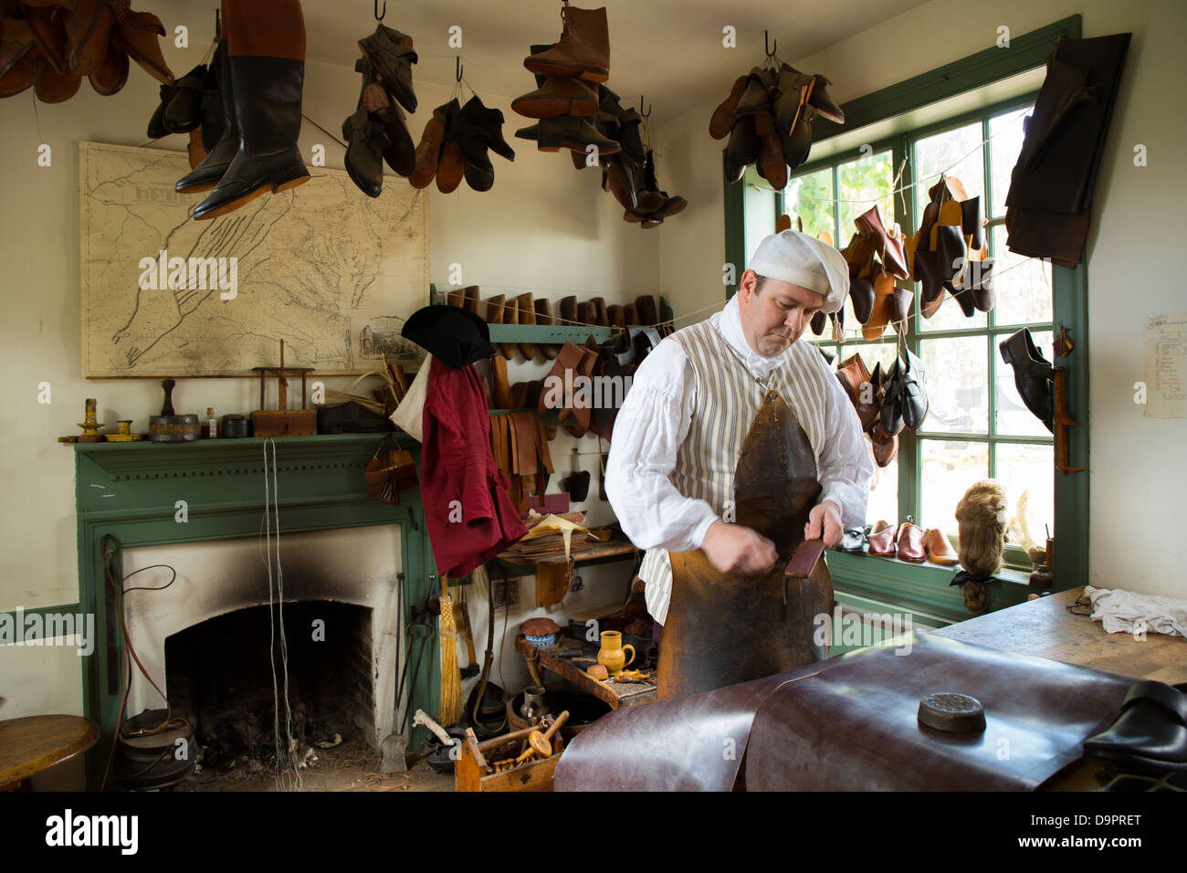 Shoe maker at Colonial, Williamsburg, Virginia, USA Stock Photo