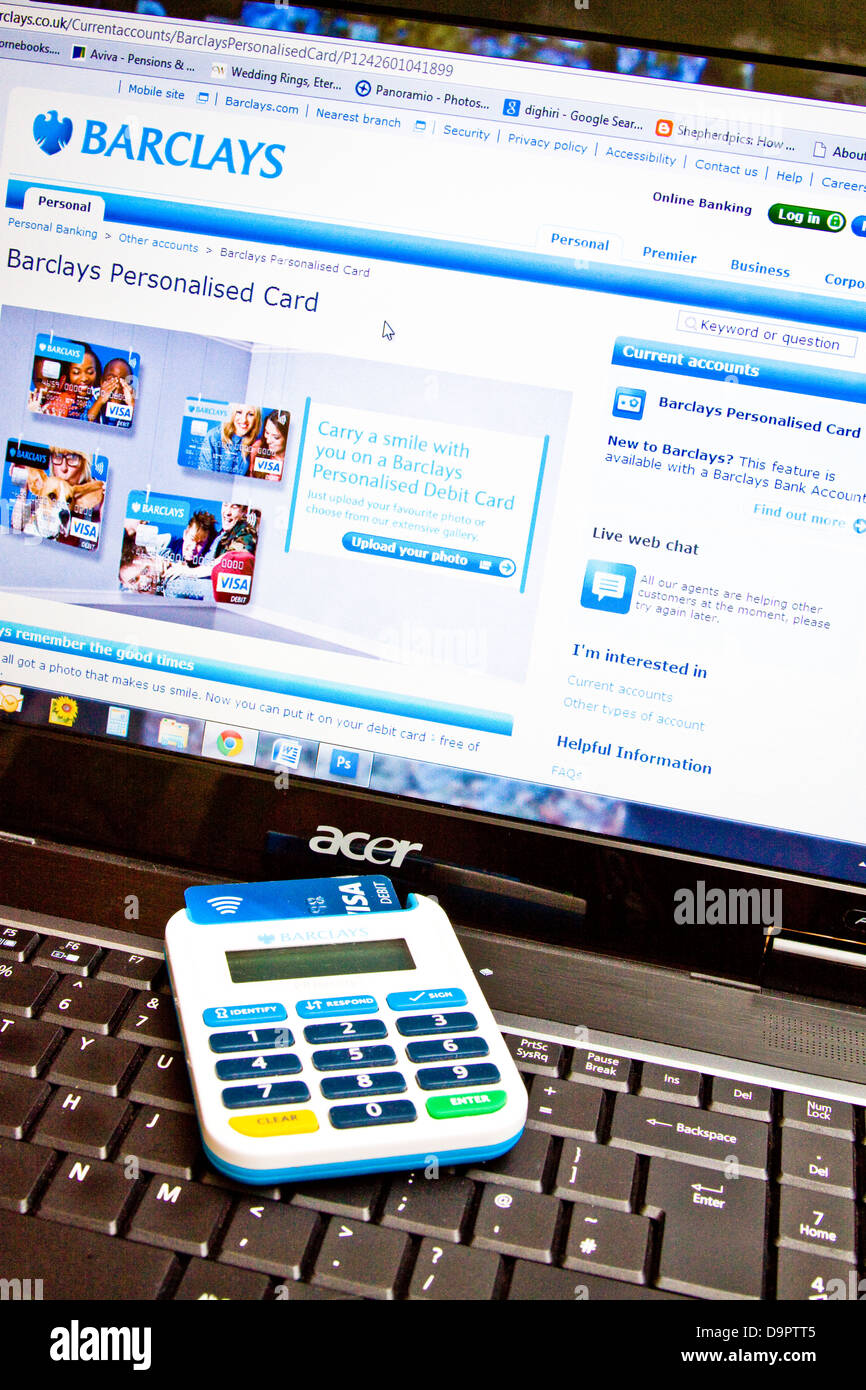 PIN sentry device on a lap top showing a Barclays online banking login page Stock Photo